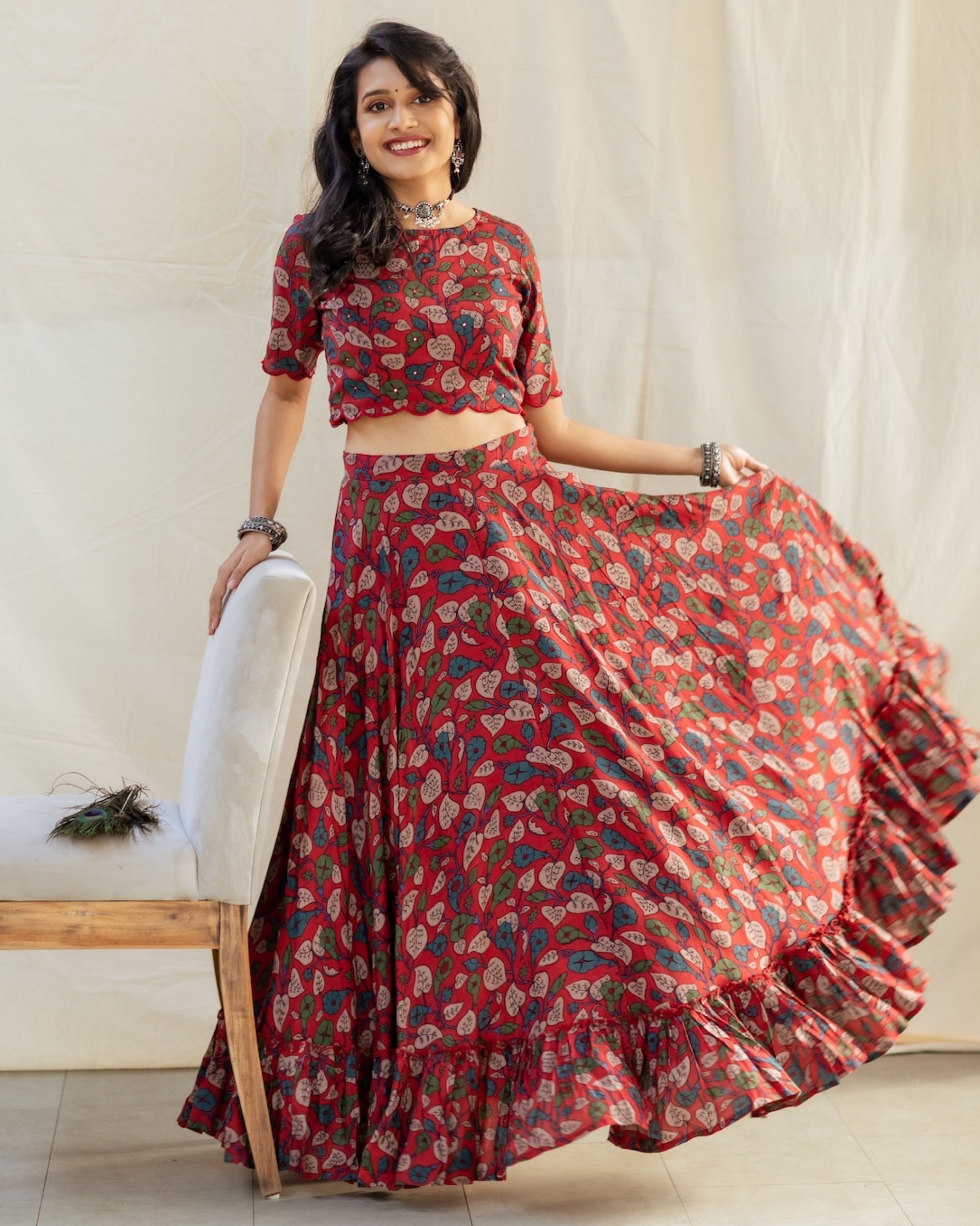 Red floral kalamkari top with ruffled skirt - set of two by Athira ...