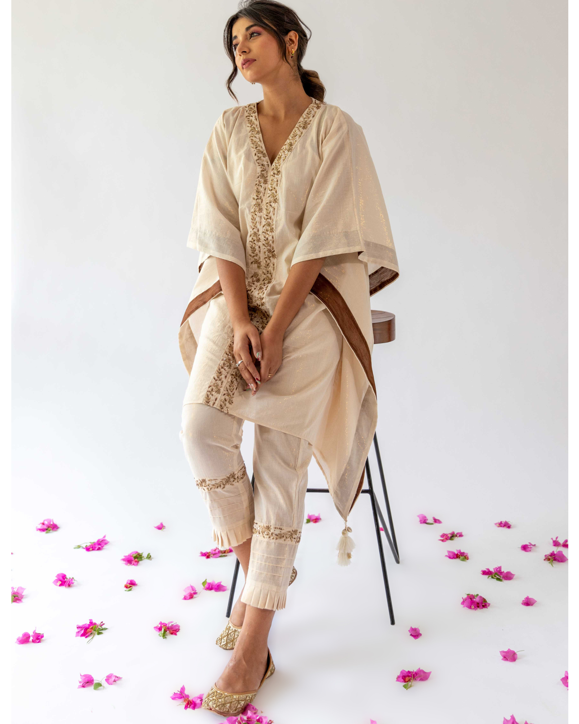 Ivory frilled pants with embroidery