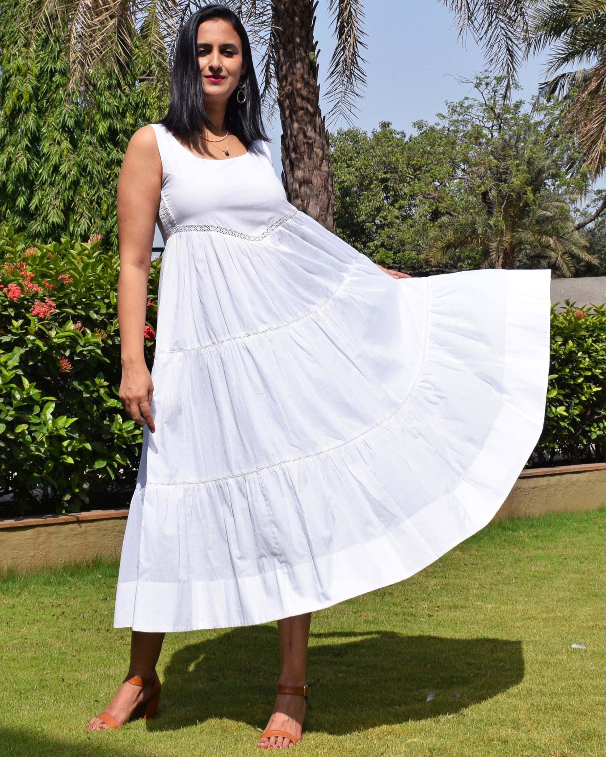 White cotton tiered dress with lace detailing