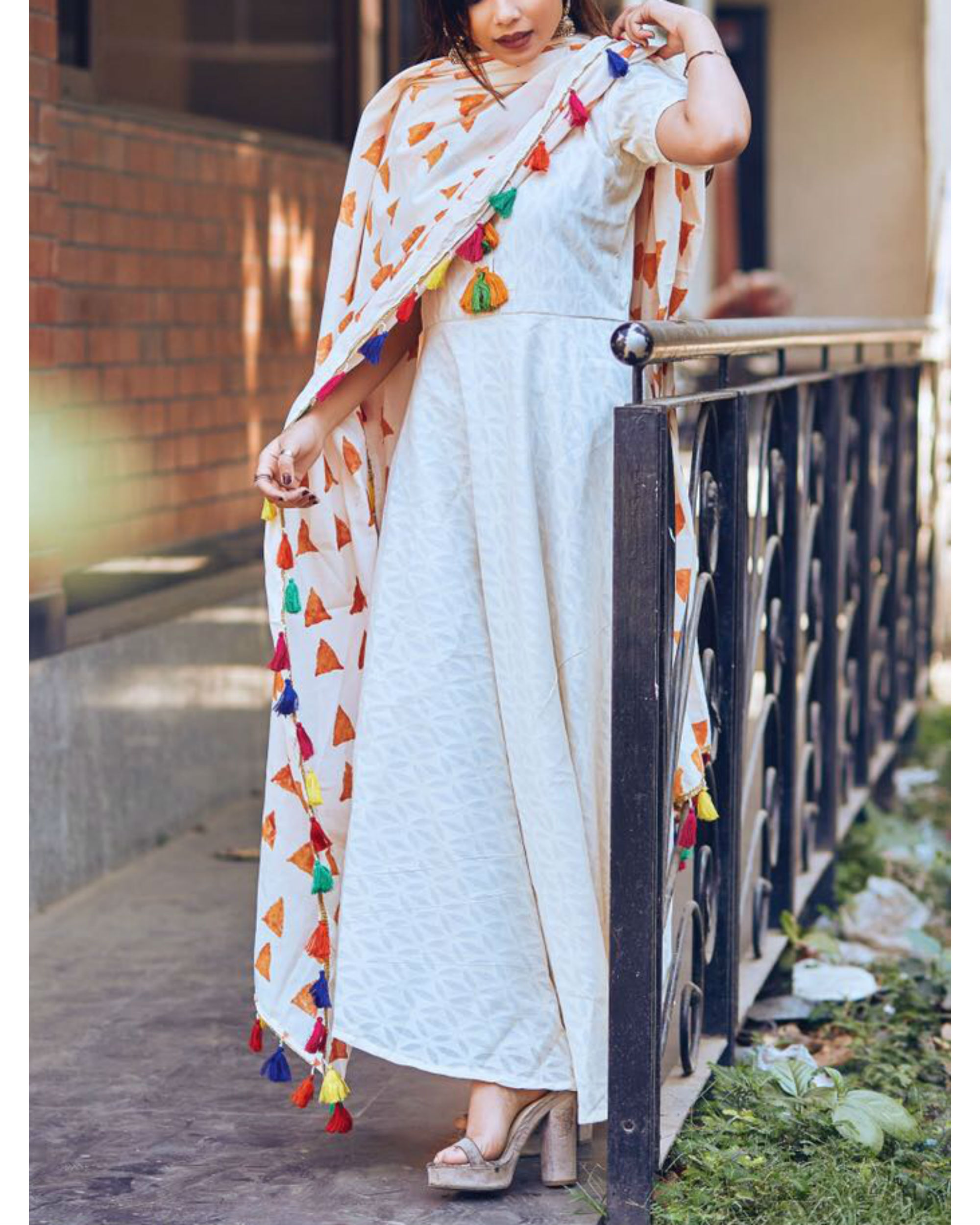 white suit with colourful dupatta