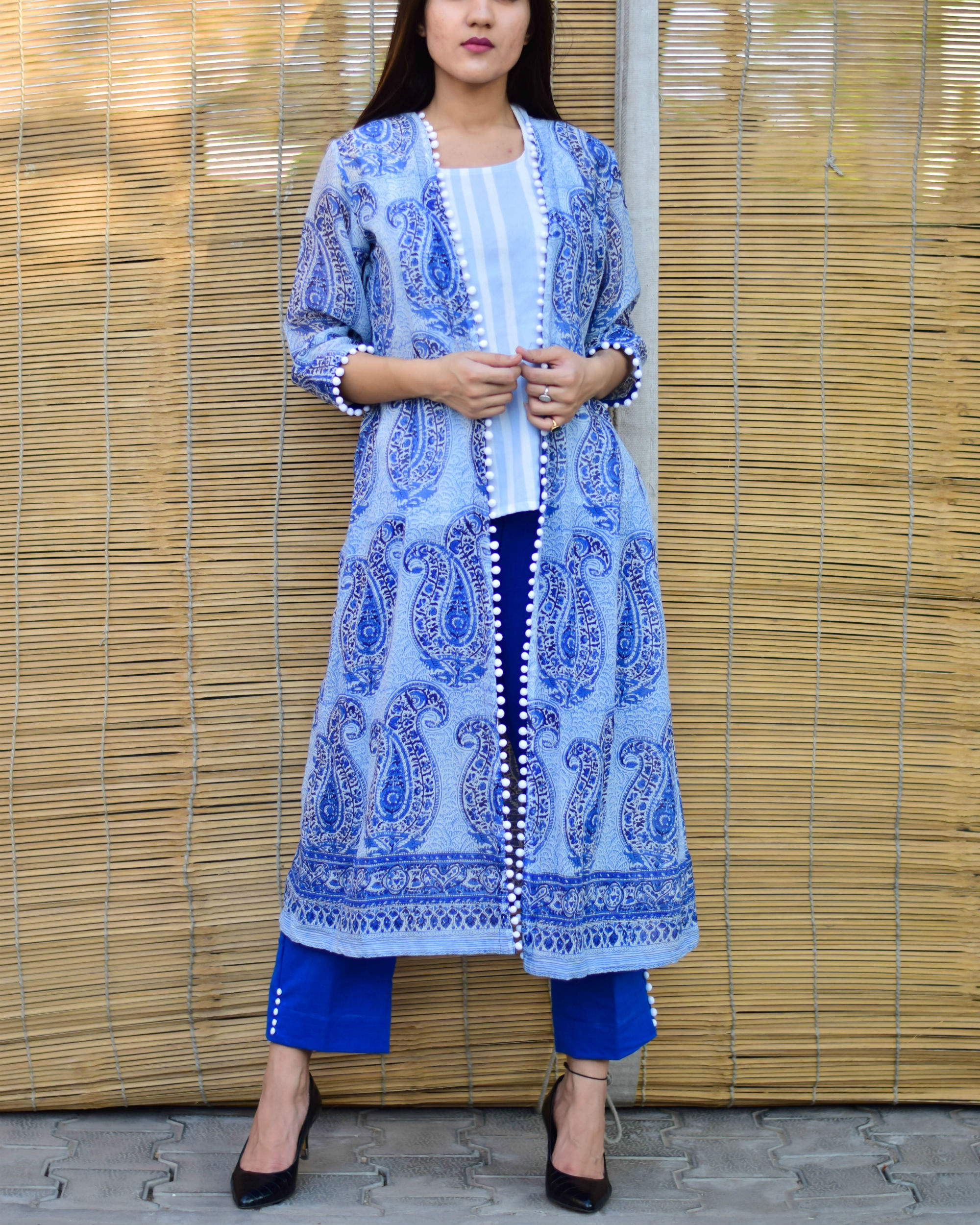 Blue block printed jacket with short top and pants by Siddhi