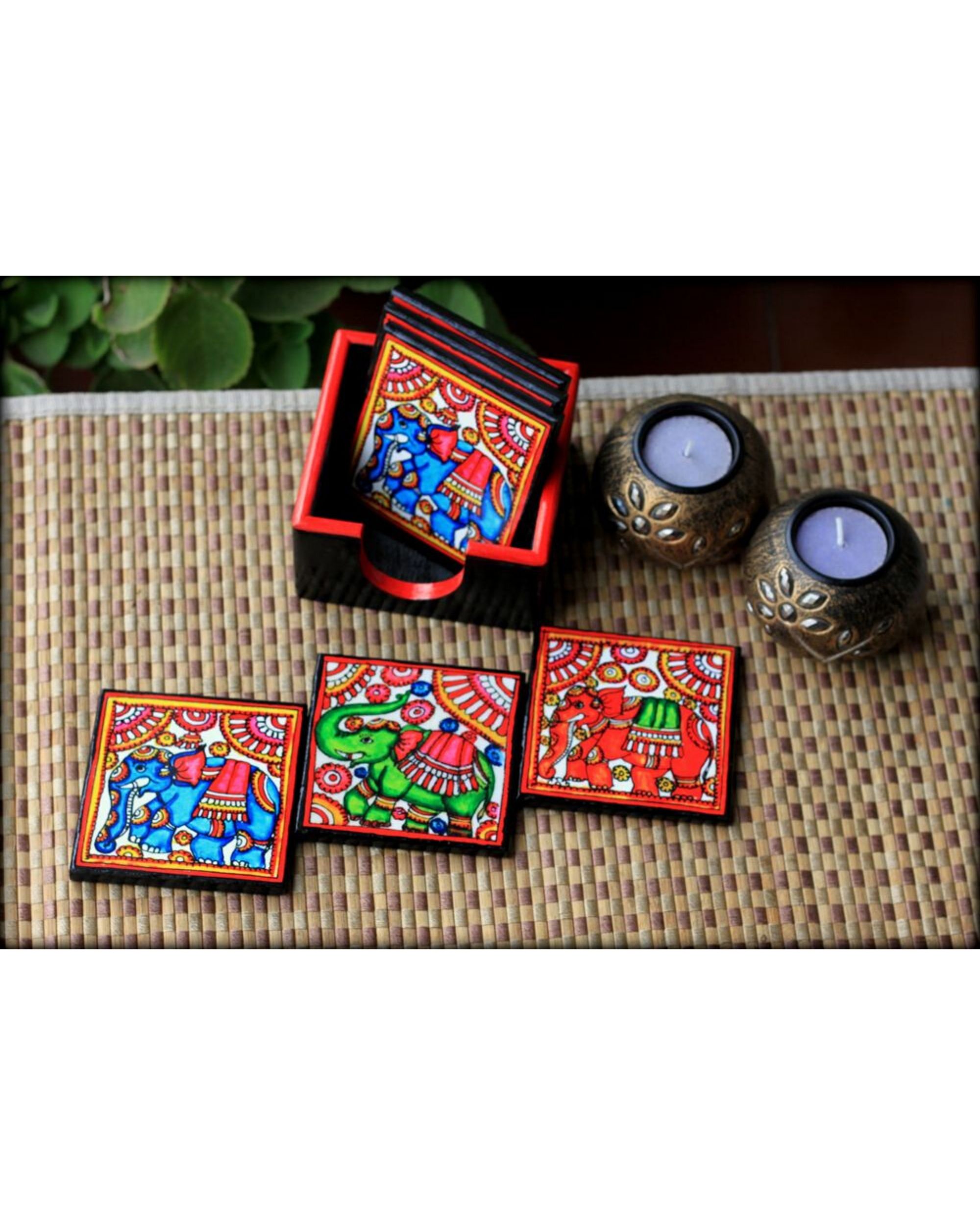 Tholu elephant wooden coasters with stand- Set Of Seven