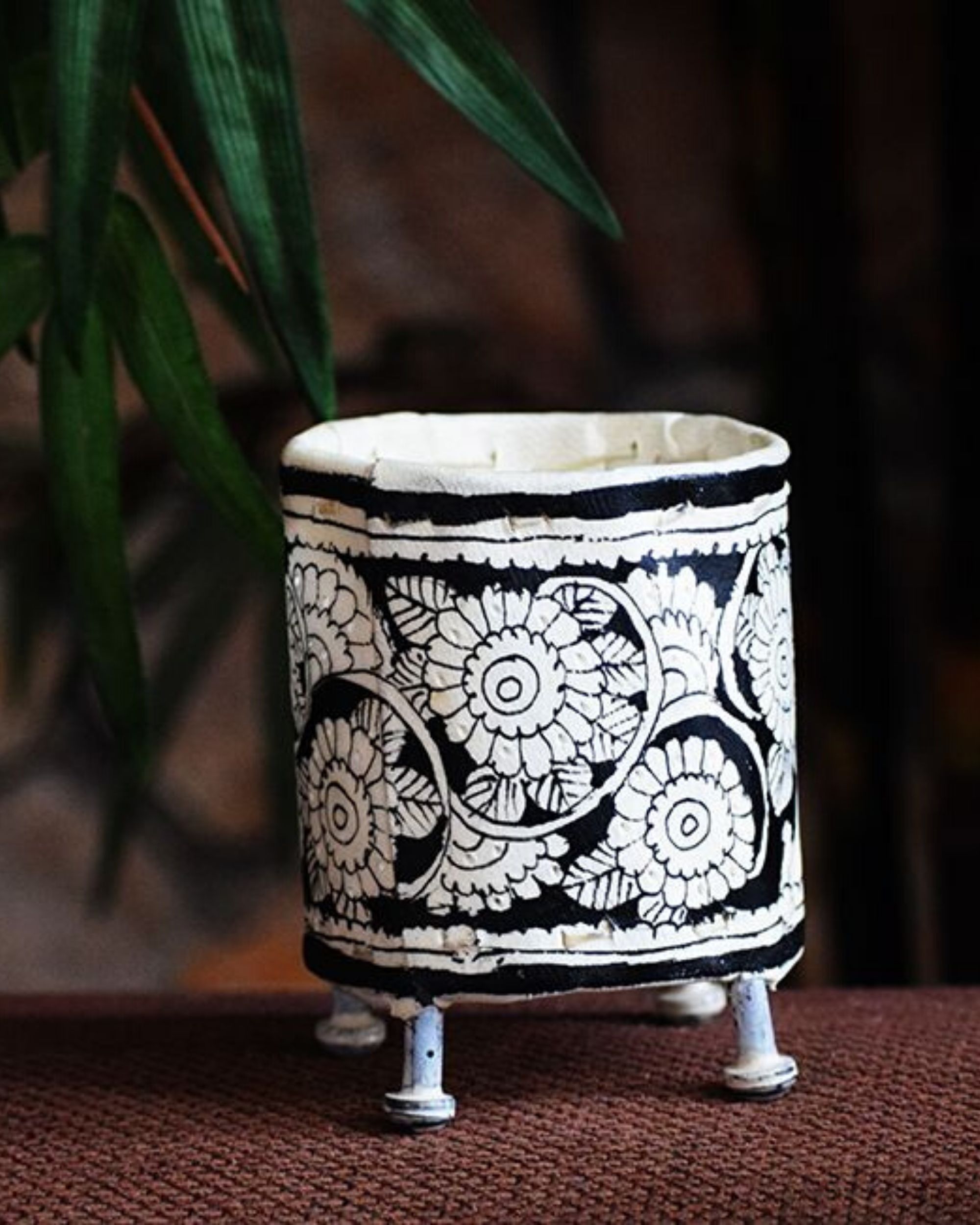 White and black hand painted votive stand