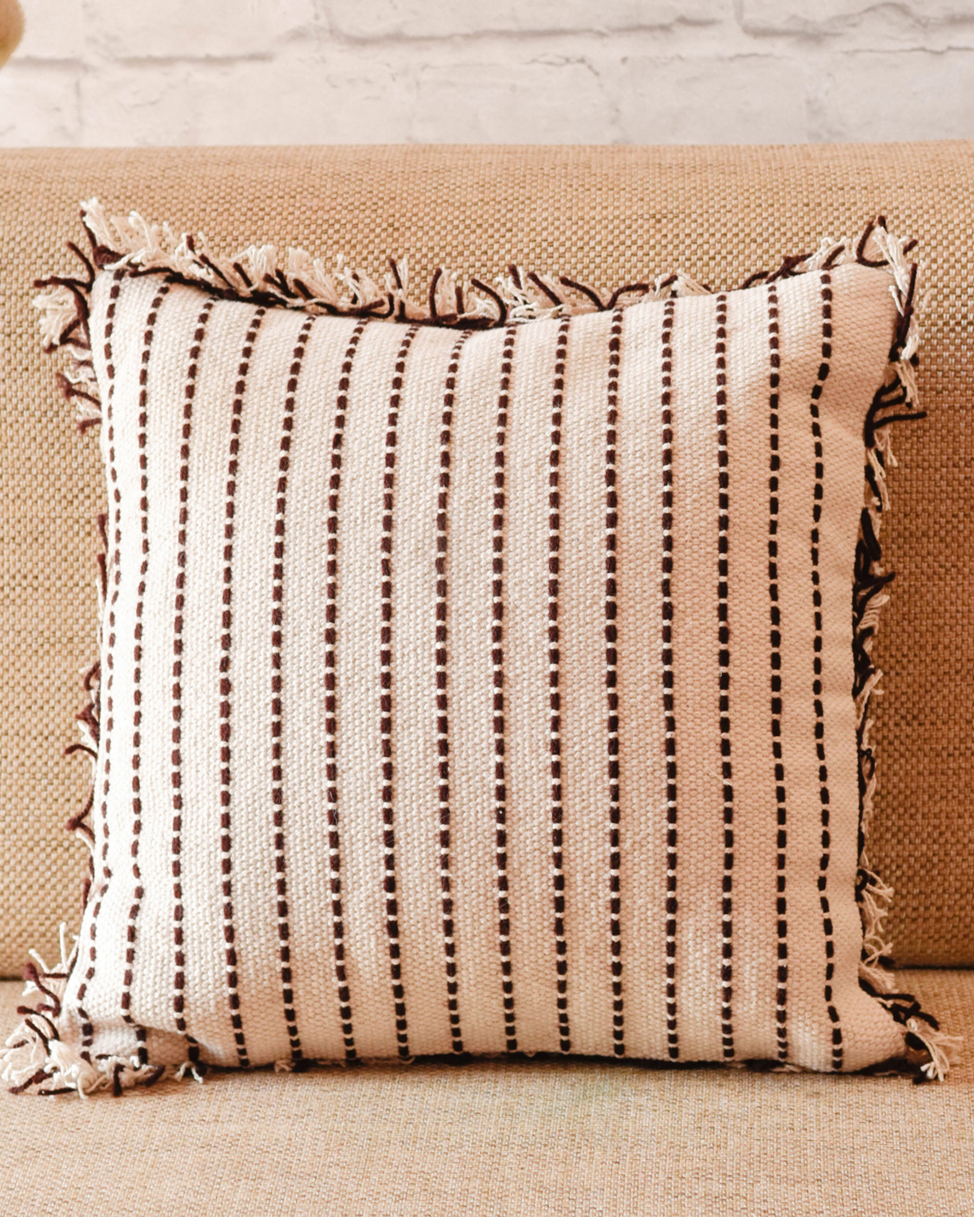 Off-white embroidered cushion covers - set of two