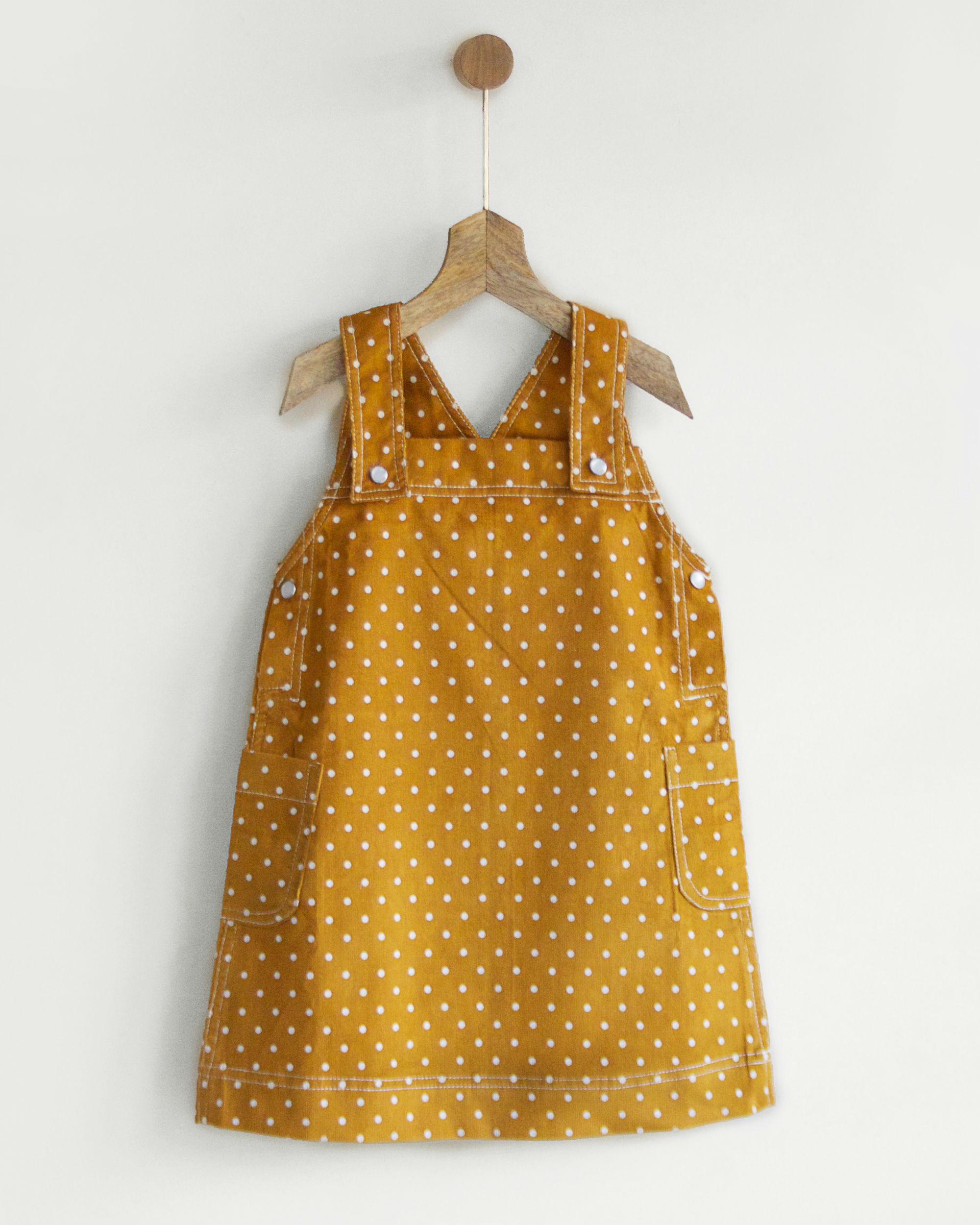 mustard corduroy pinafore dress