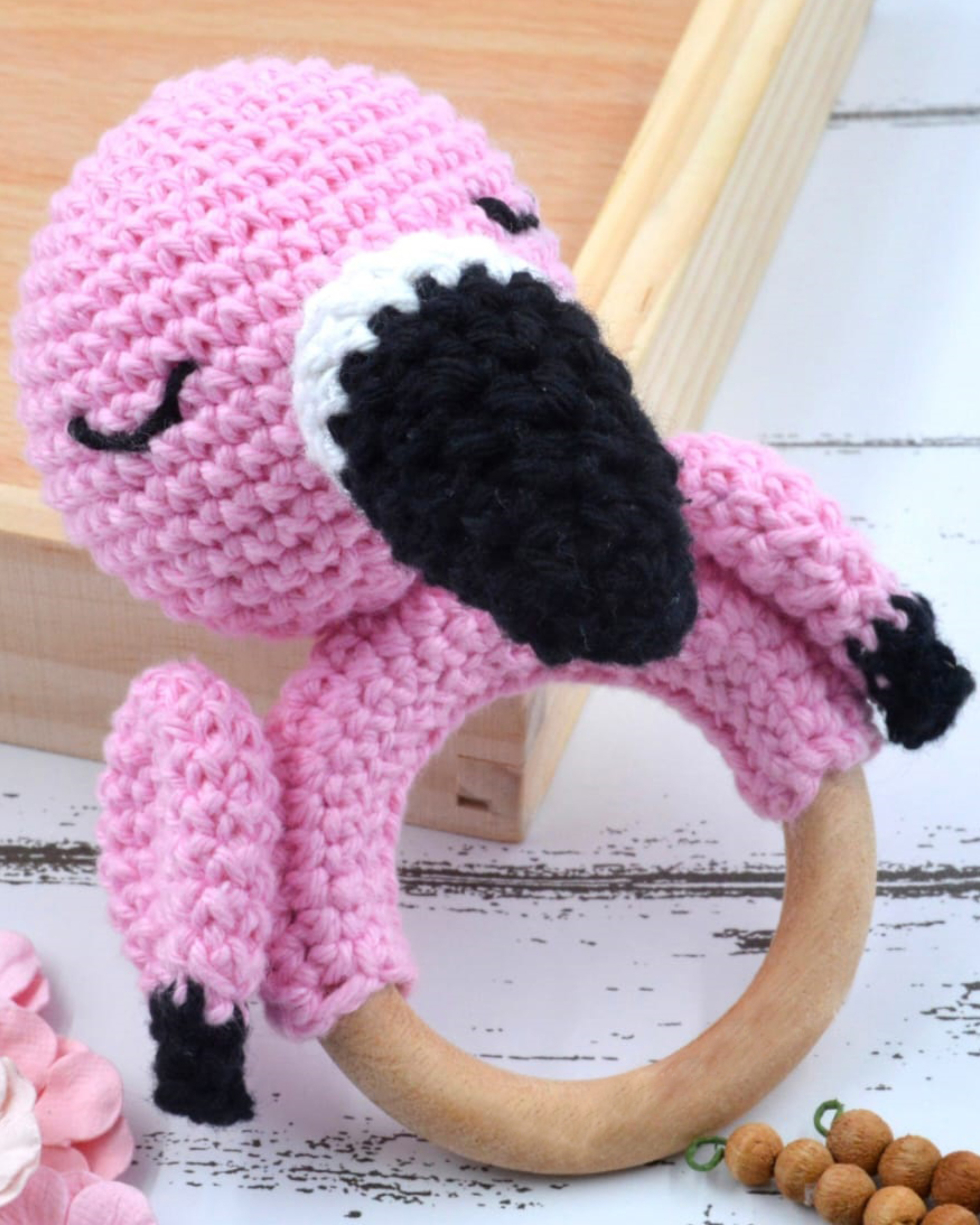 Pink hand crocheted baby sound rattle - flamingo
