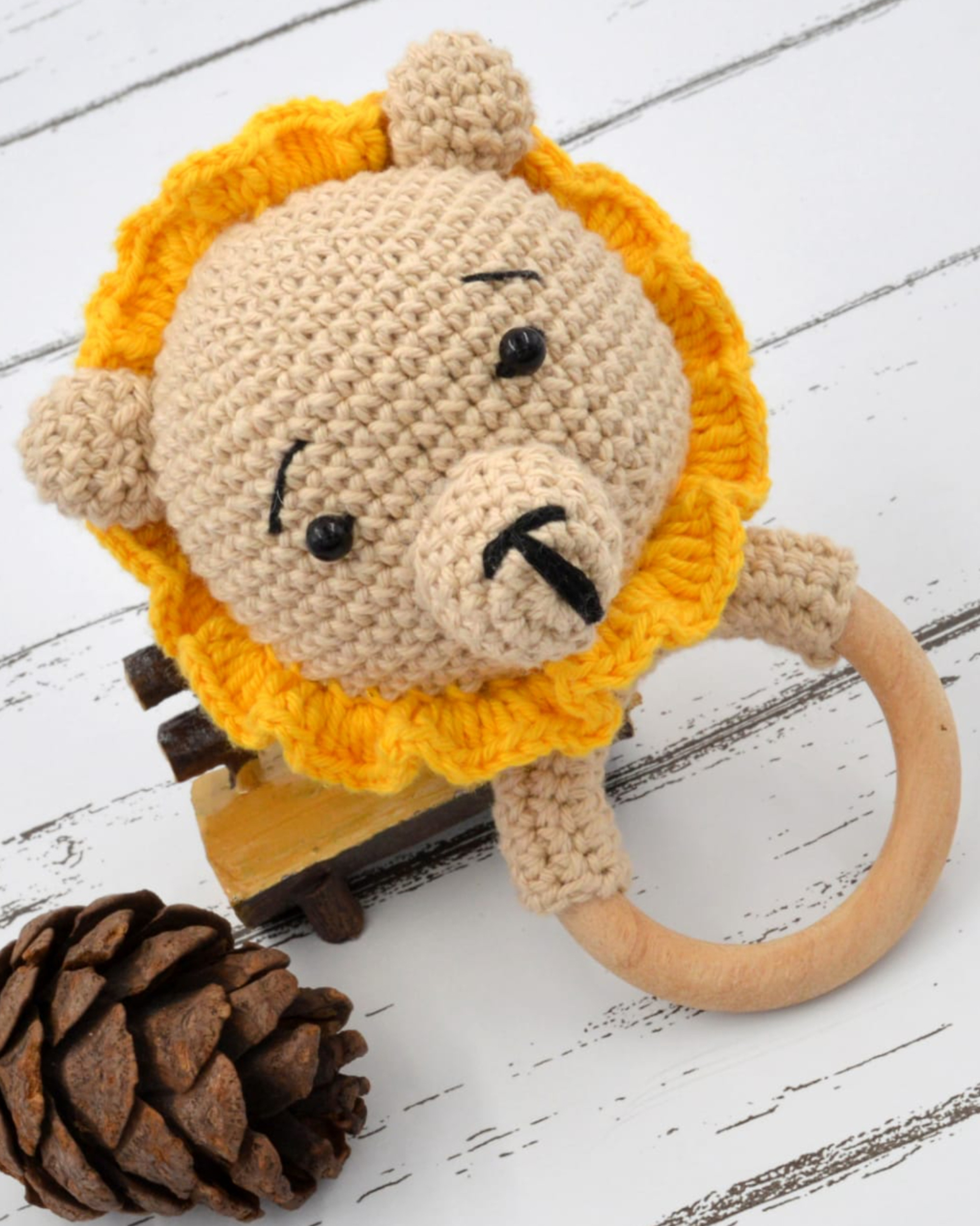 Hand crocheted baby sound rattle - lion