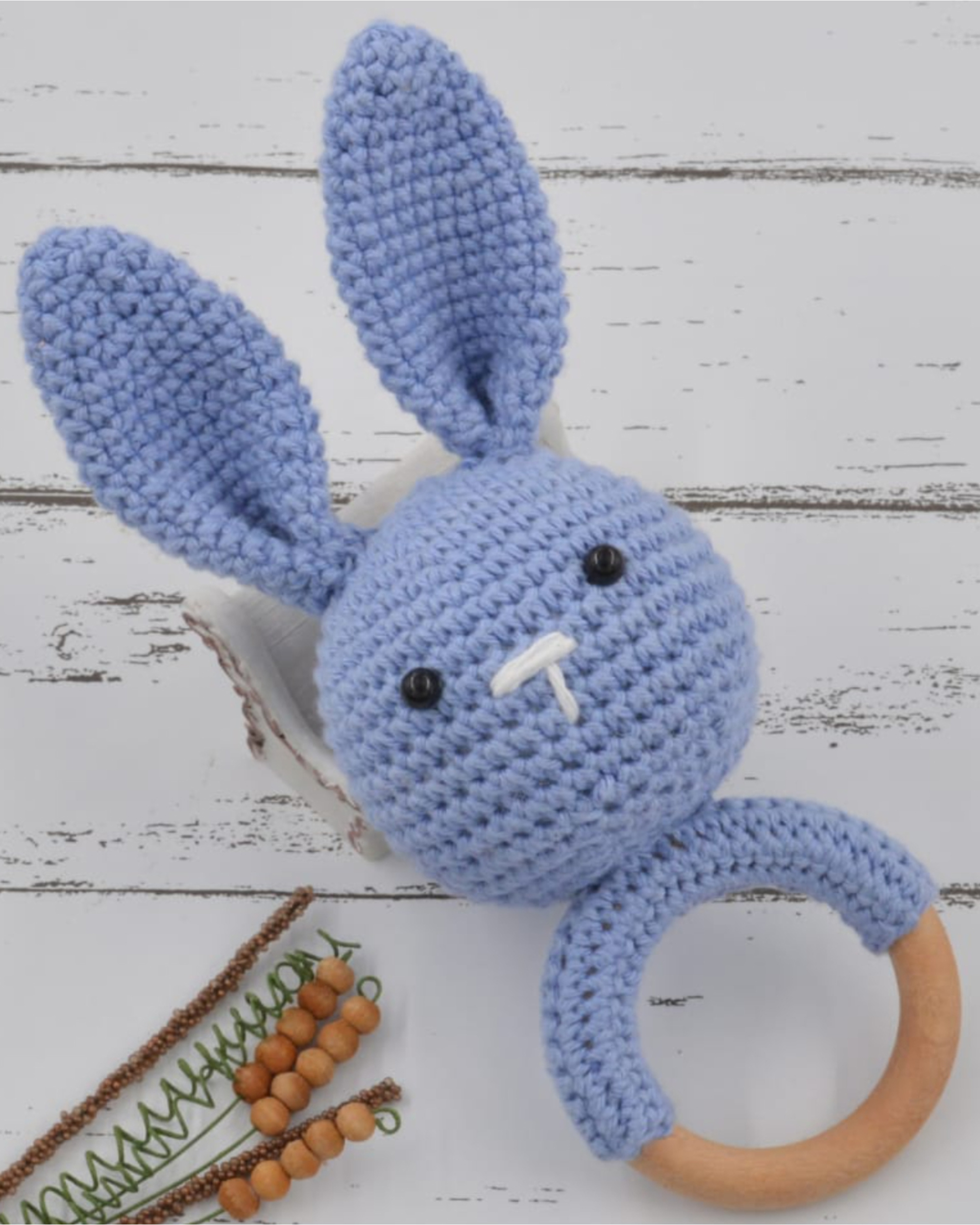 Blue hand crocheted baby sound rattle - bunny