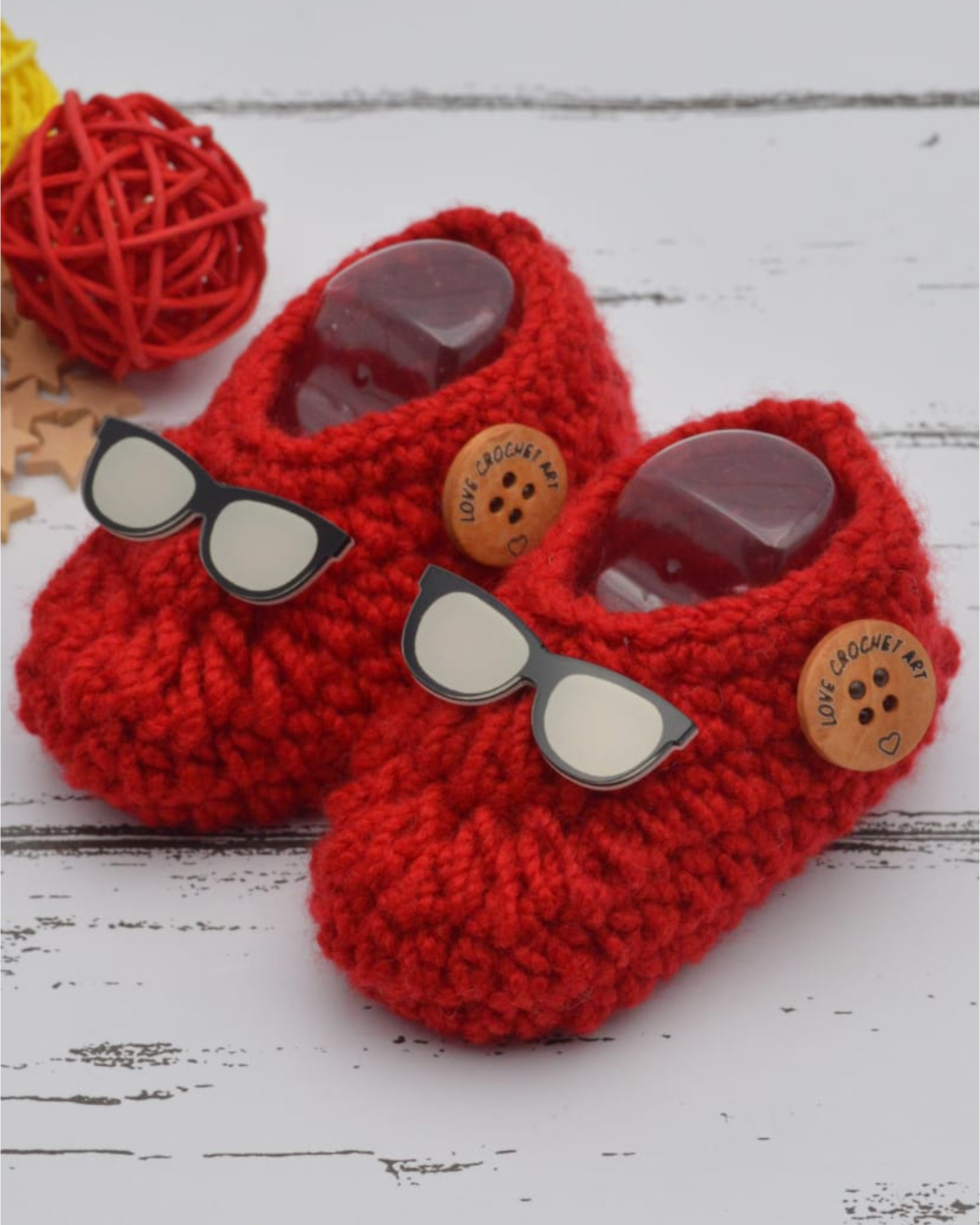Red hand crocheted woollen booties