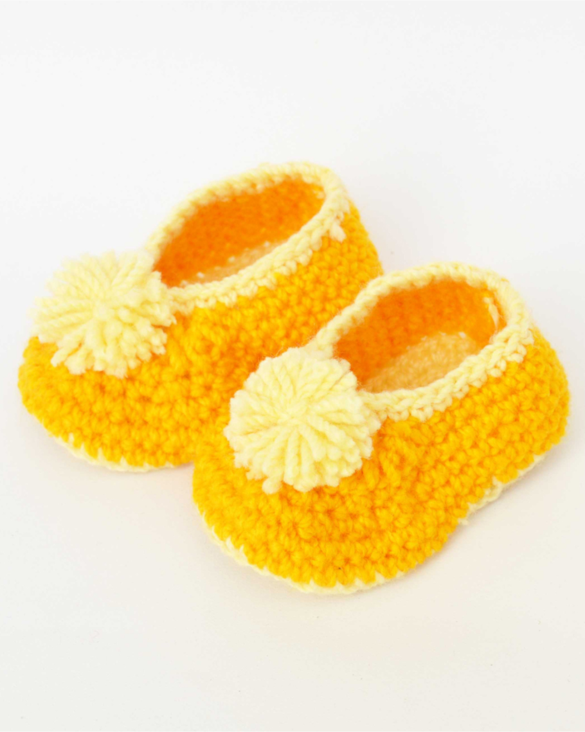Yellow hand crocheted woollen booties