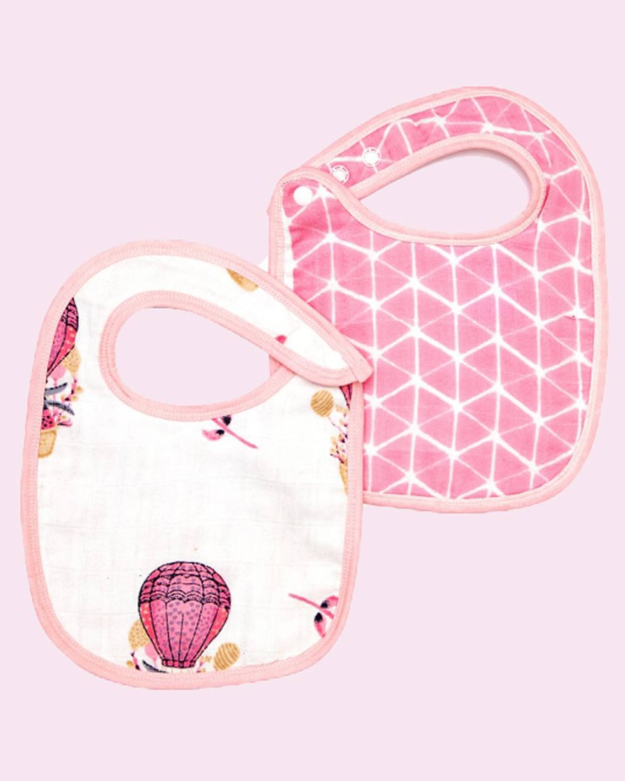 White and pink parachute printed muslin baby bib - set of two