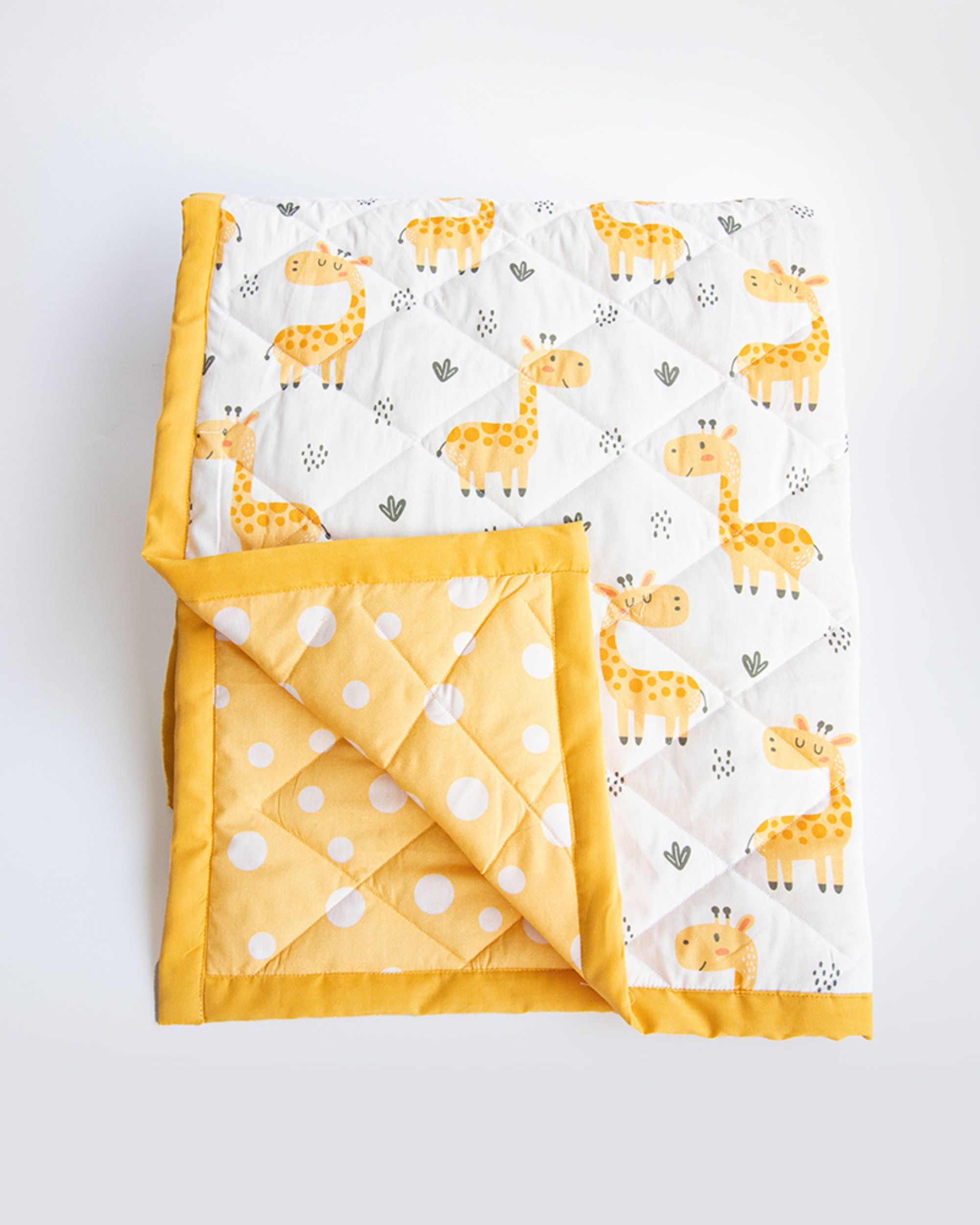 Baby giraffe printed reversible quilt