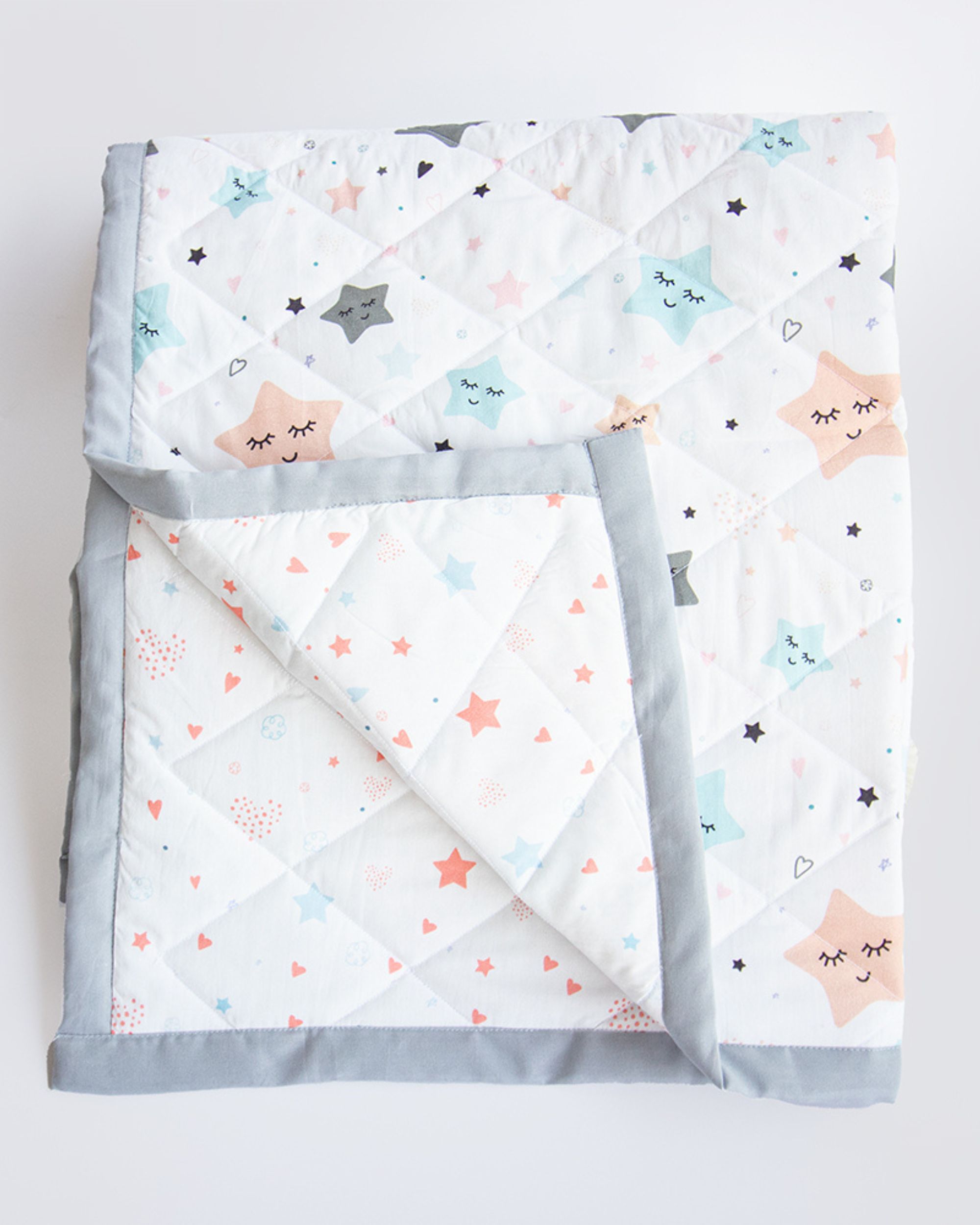 Twinkly stars themed reversible quilt