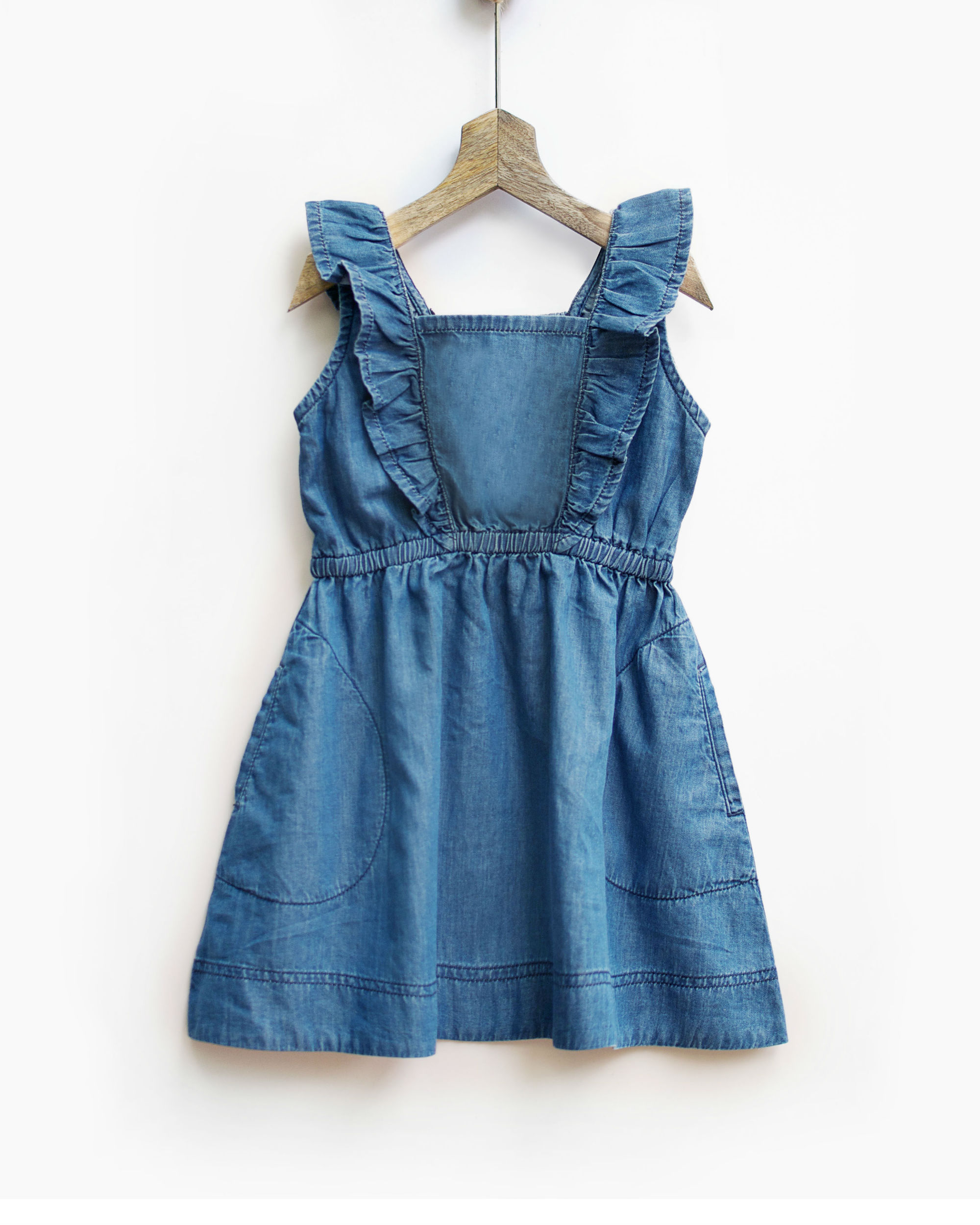 Mid wash ruffled denim pinafore by Pluie Kids | The Secret Label