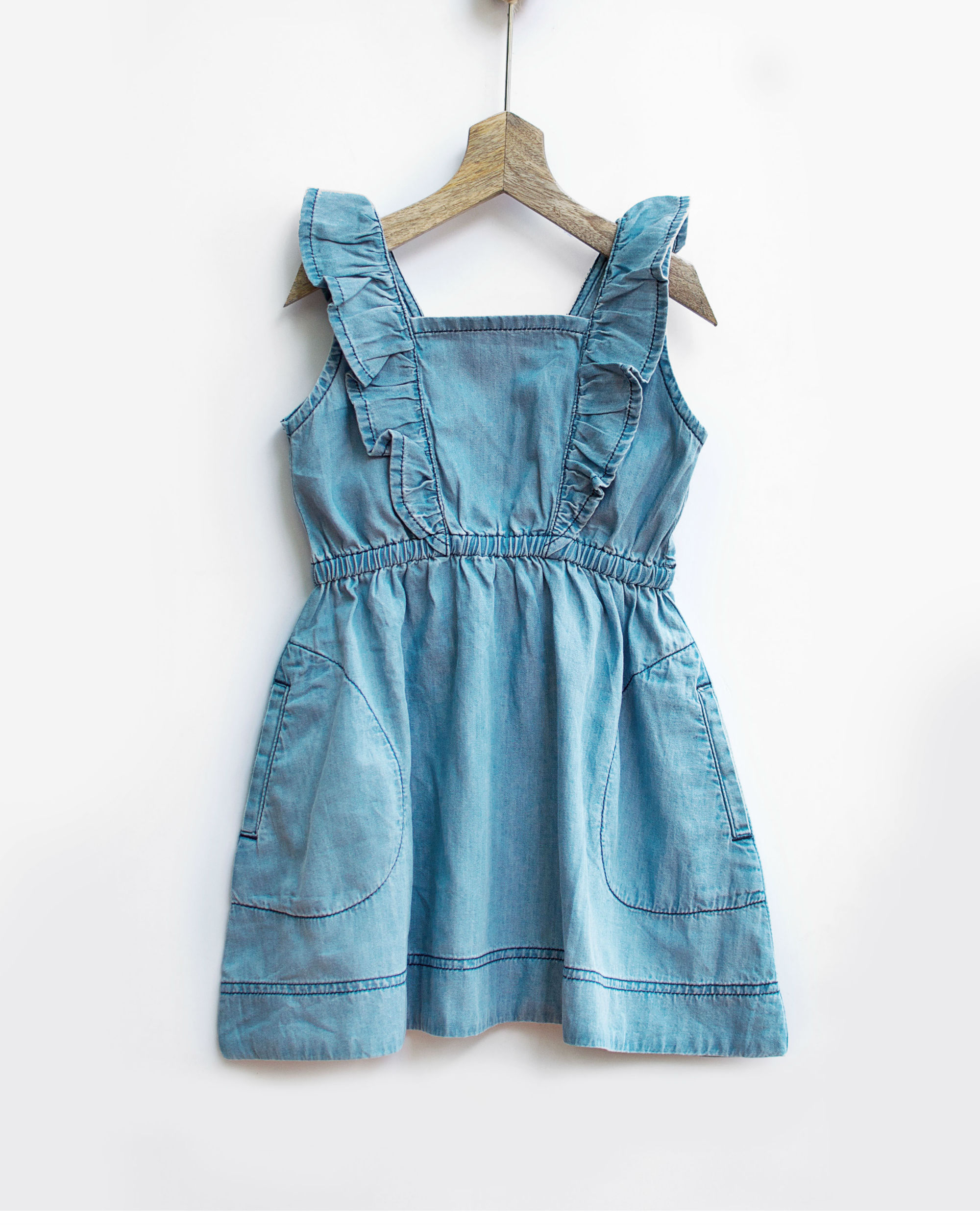 Ice wash ruffled denim pinafore by Pluie Kids | The Secret Label