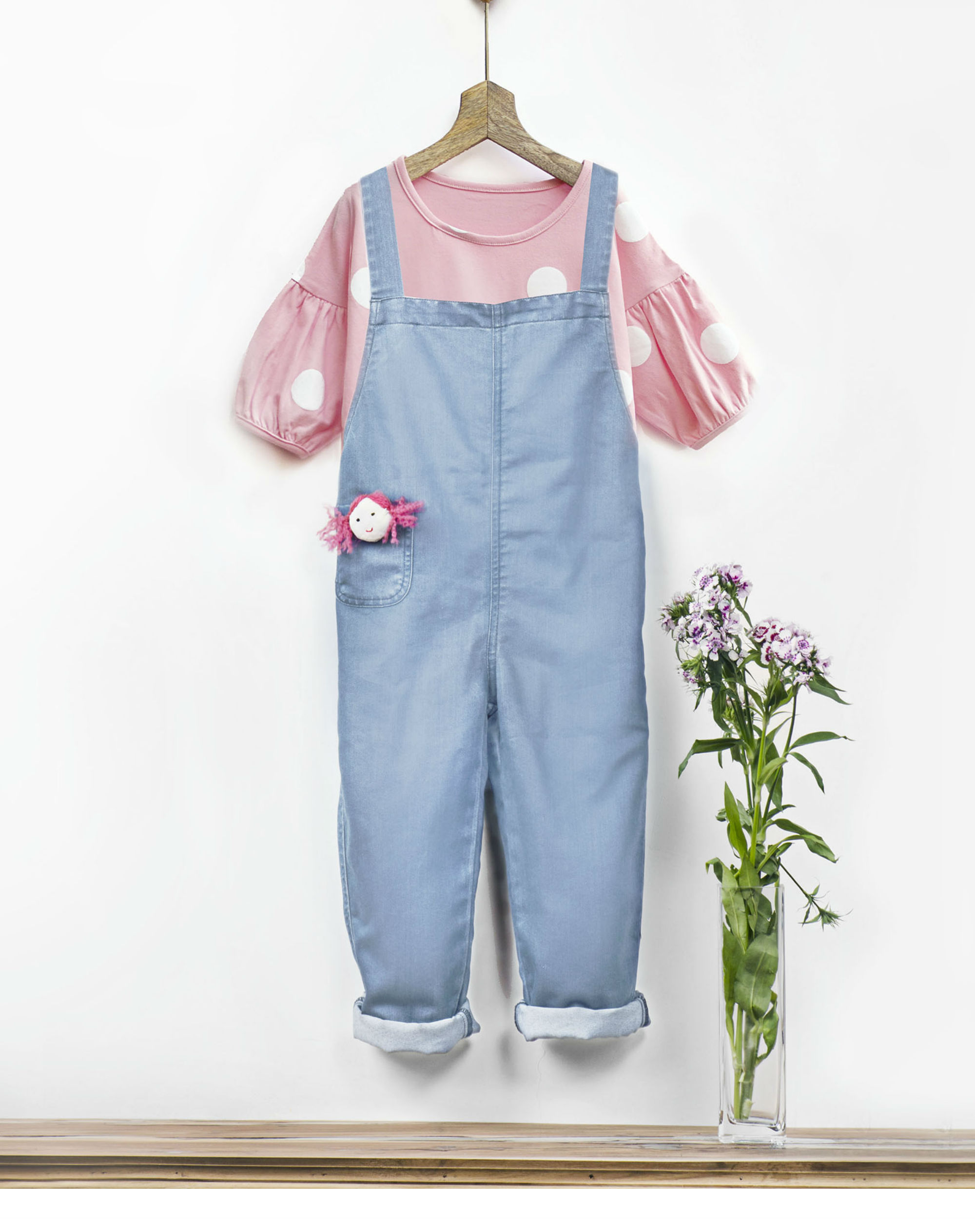 Ice wash denim romper with fabric brooch by Pluie Kids | The Secret Label