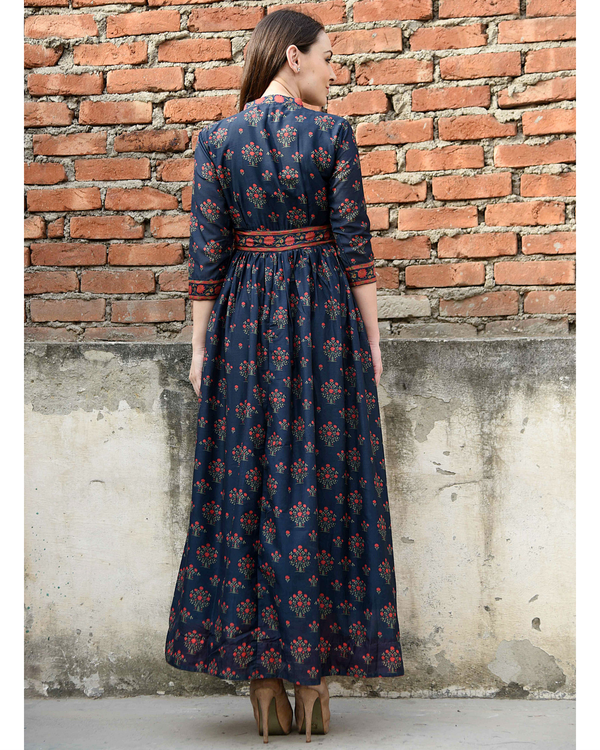 Prussian blue and red cape by Desi Doree | The Secret Label