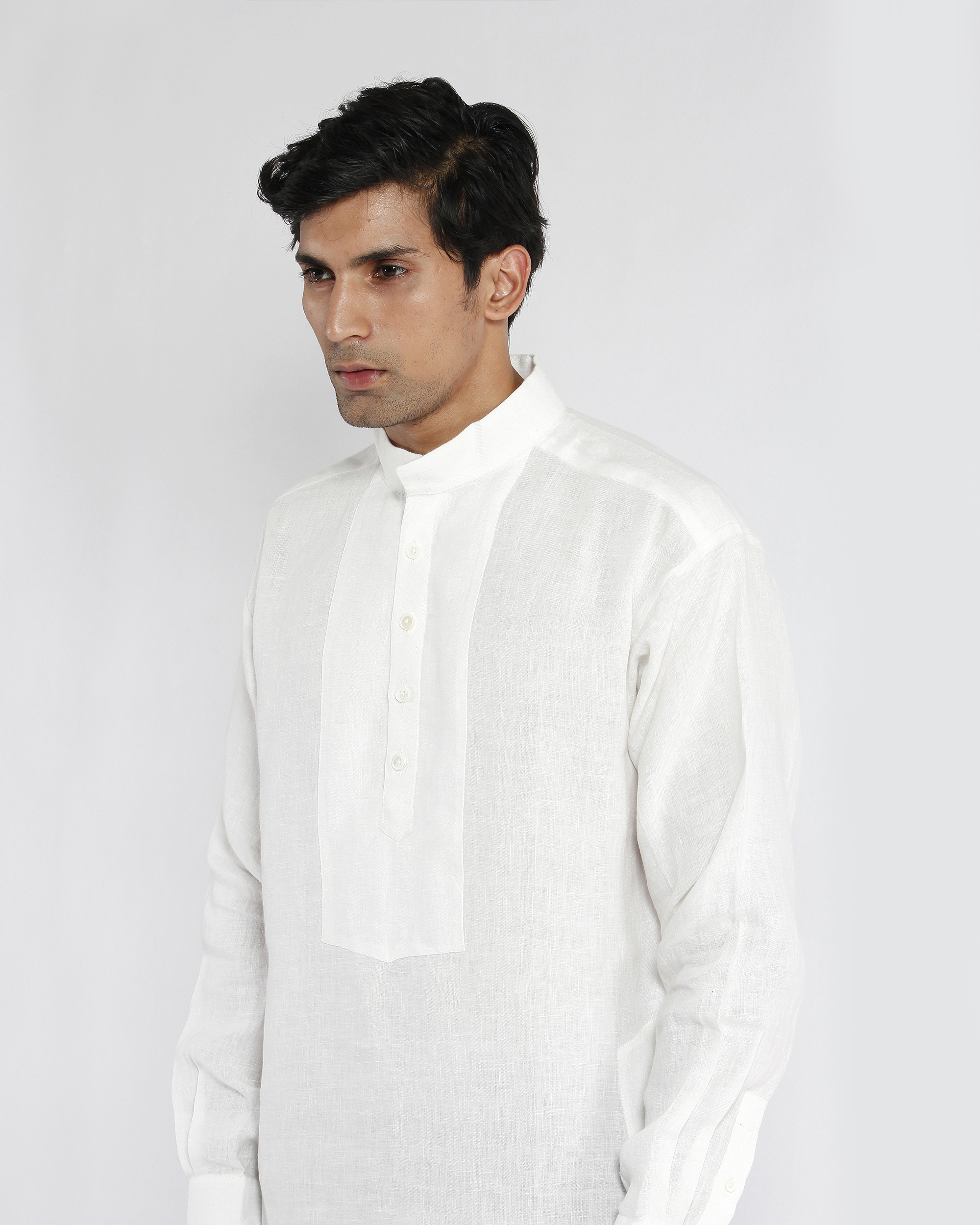 White linen drop shoulder kurta by Dhatu Design Studio | The Secret Label