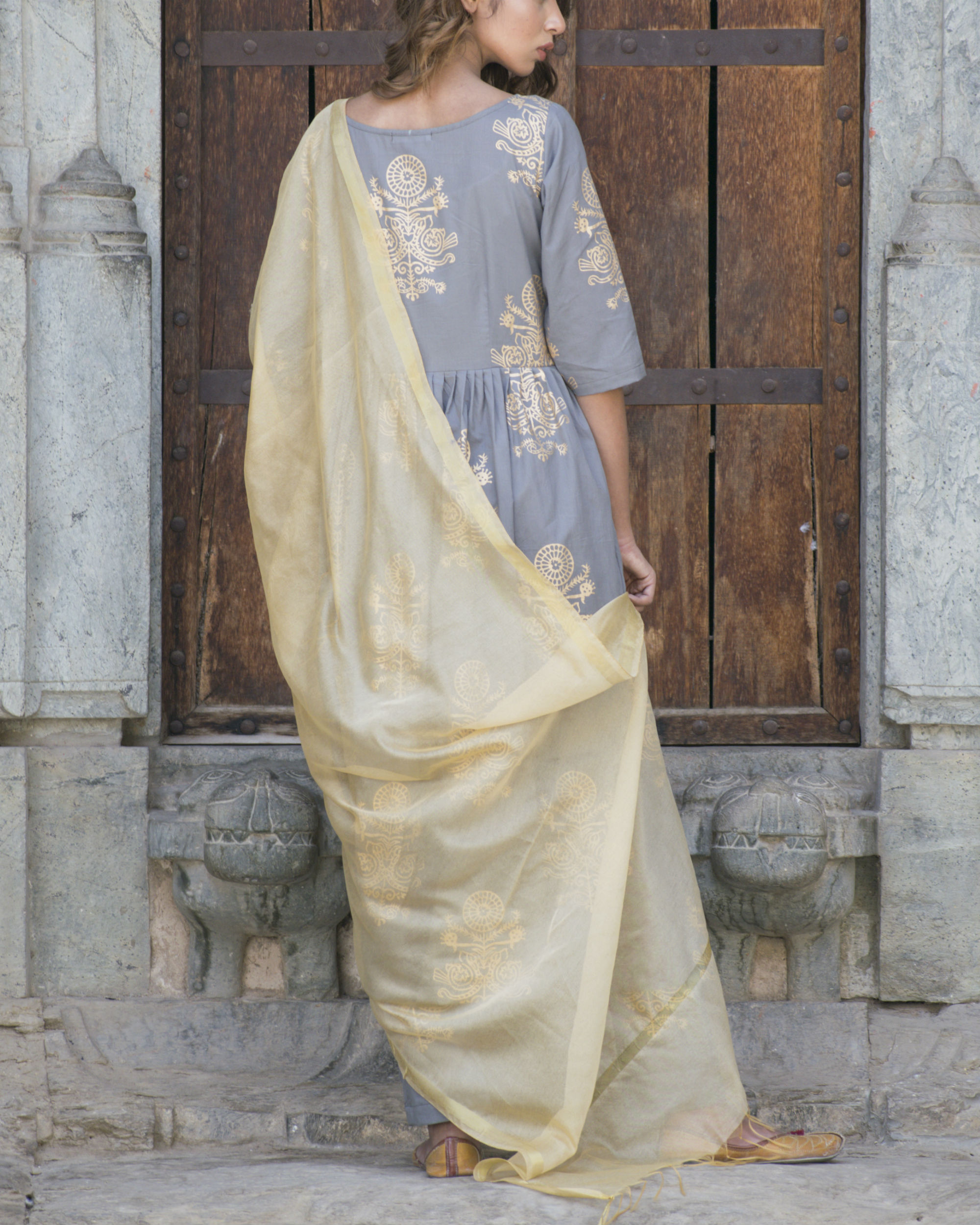 grey suit with golden dupatta