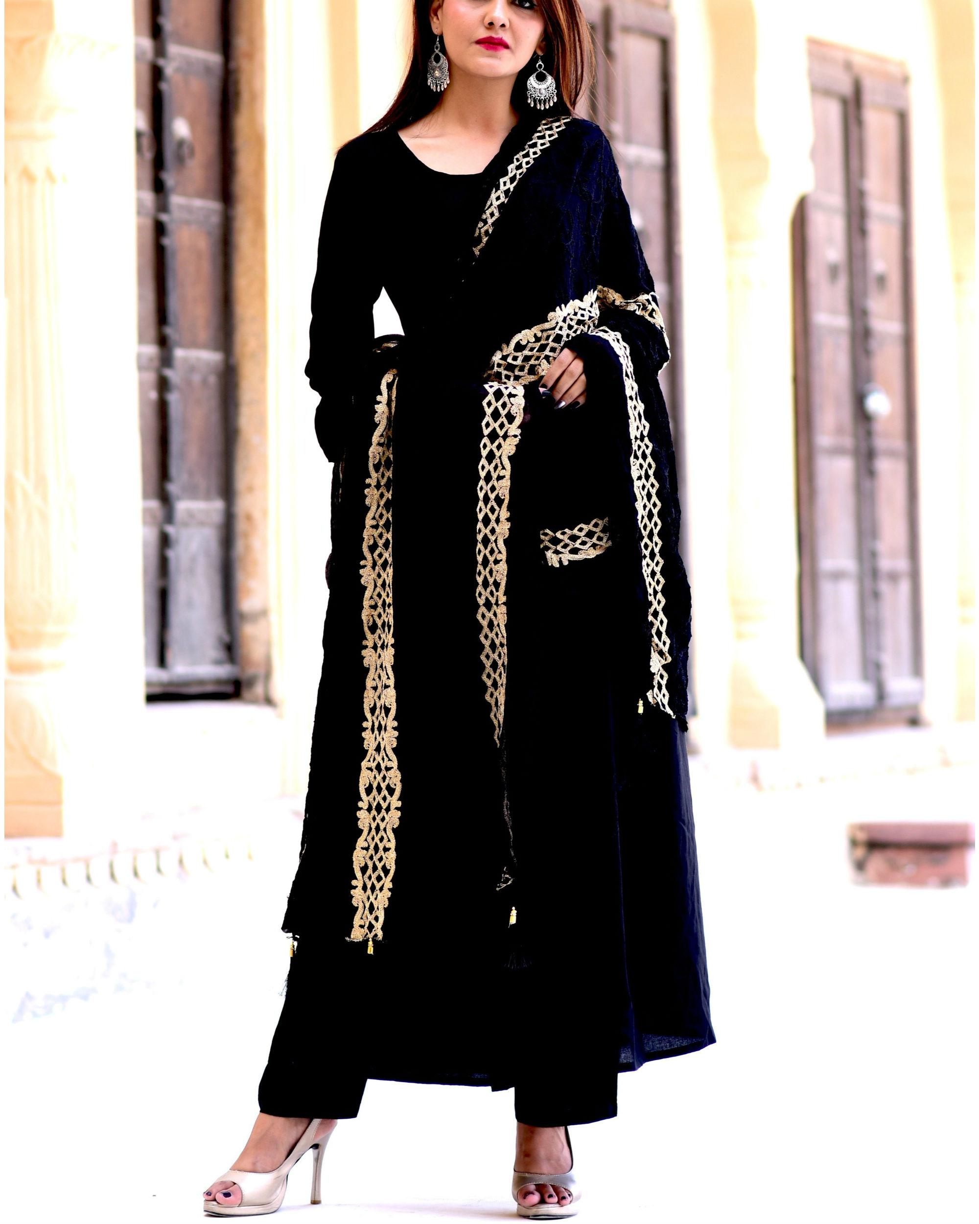 black punjabi suit with golden dupatta