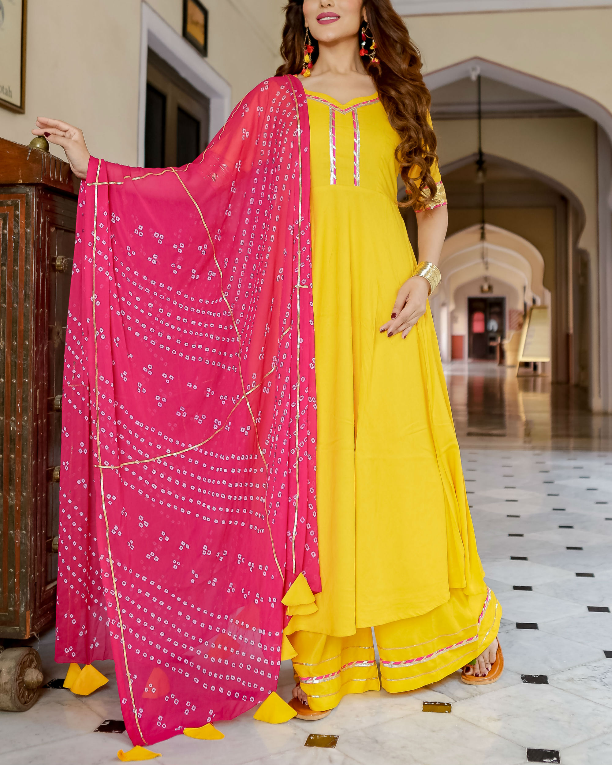 Yellow kurta set with bandhani dupatta by Floral Tales | The Secret Label