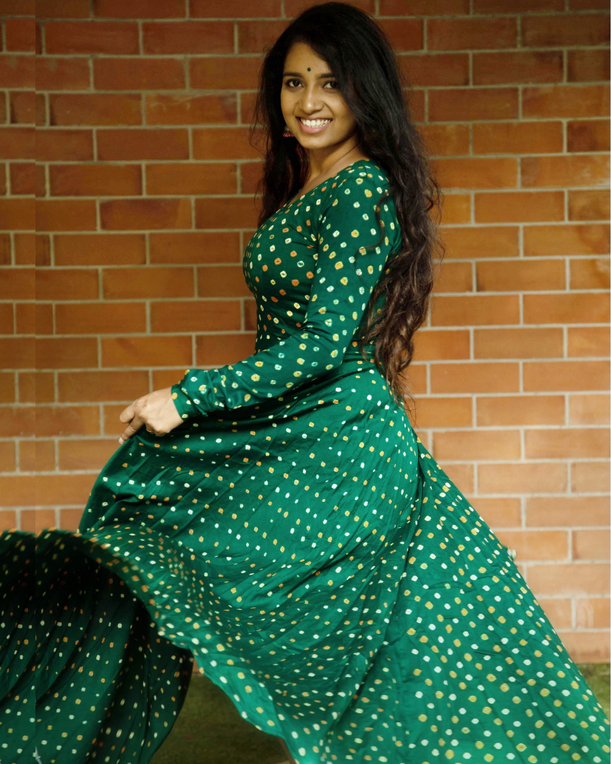 Green bandhani flared dress by Athira ...