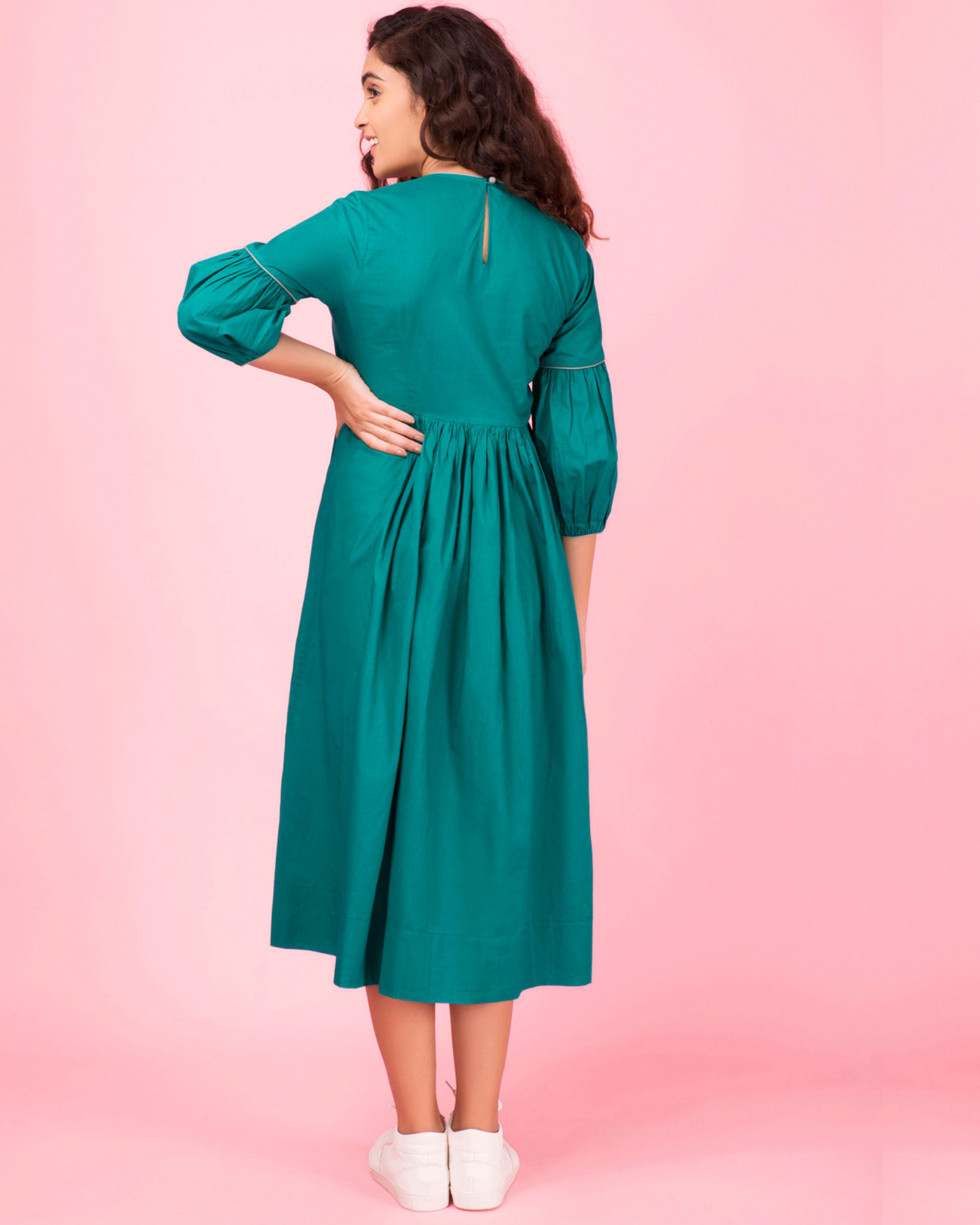 Emerald pleated dress by Twirl Studio The Secret Label
