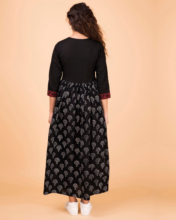 Black wrap dress by Twirl Studio | The Secret Label