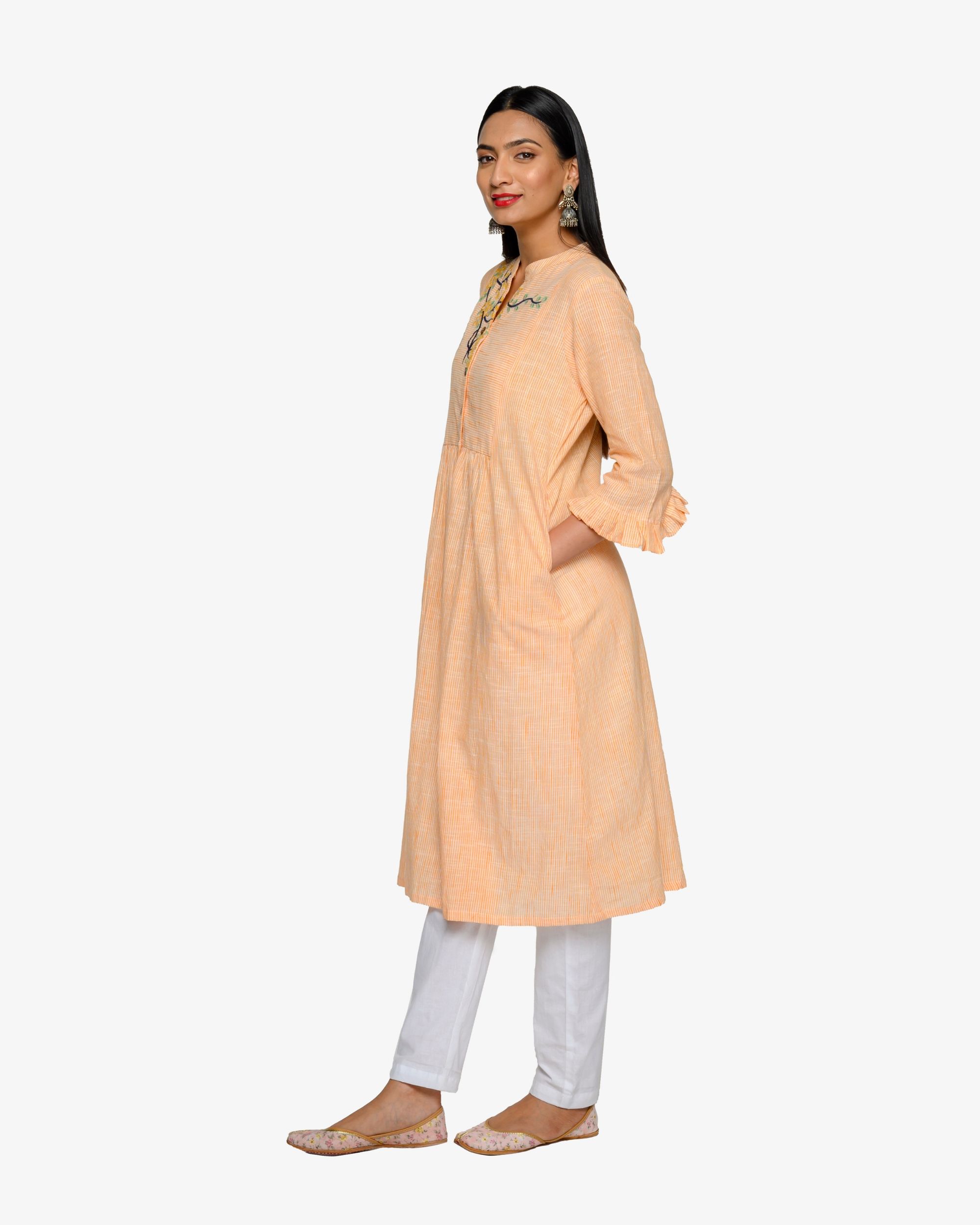 peach and white suit