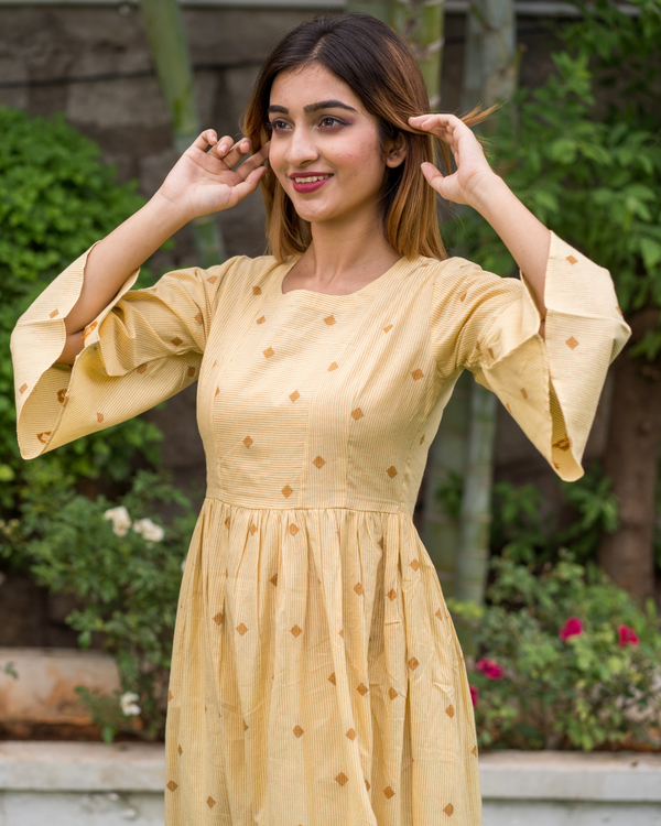 Yellow Bell Sleeves dress with motif by Kaaj | The Secret Label