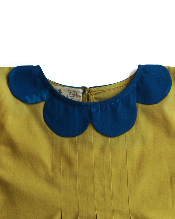 Mustard yellow pleated dress by Miko Lolo The Secret Label