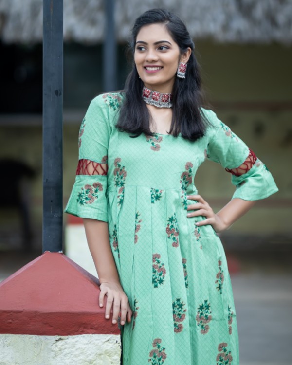 Pistachio green floral printed pleated dress with sleeve detailing 2