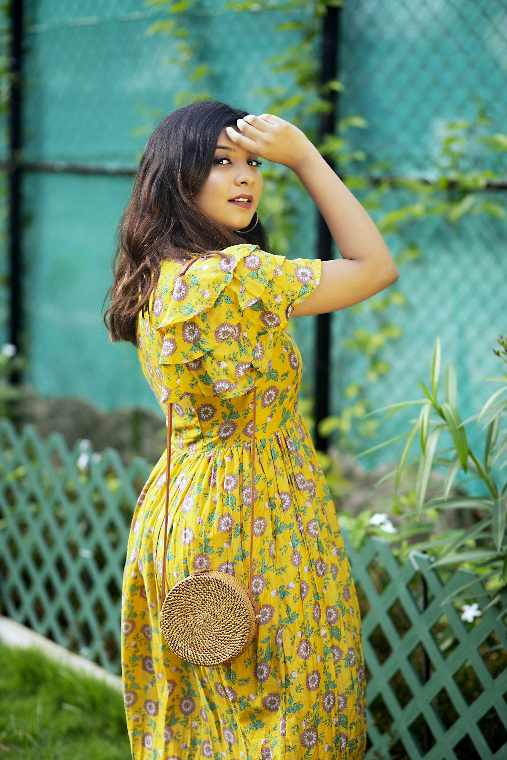 Mustard yellow floral printed ruffle dress by Athira Designs