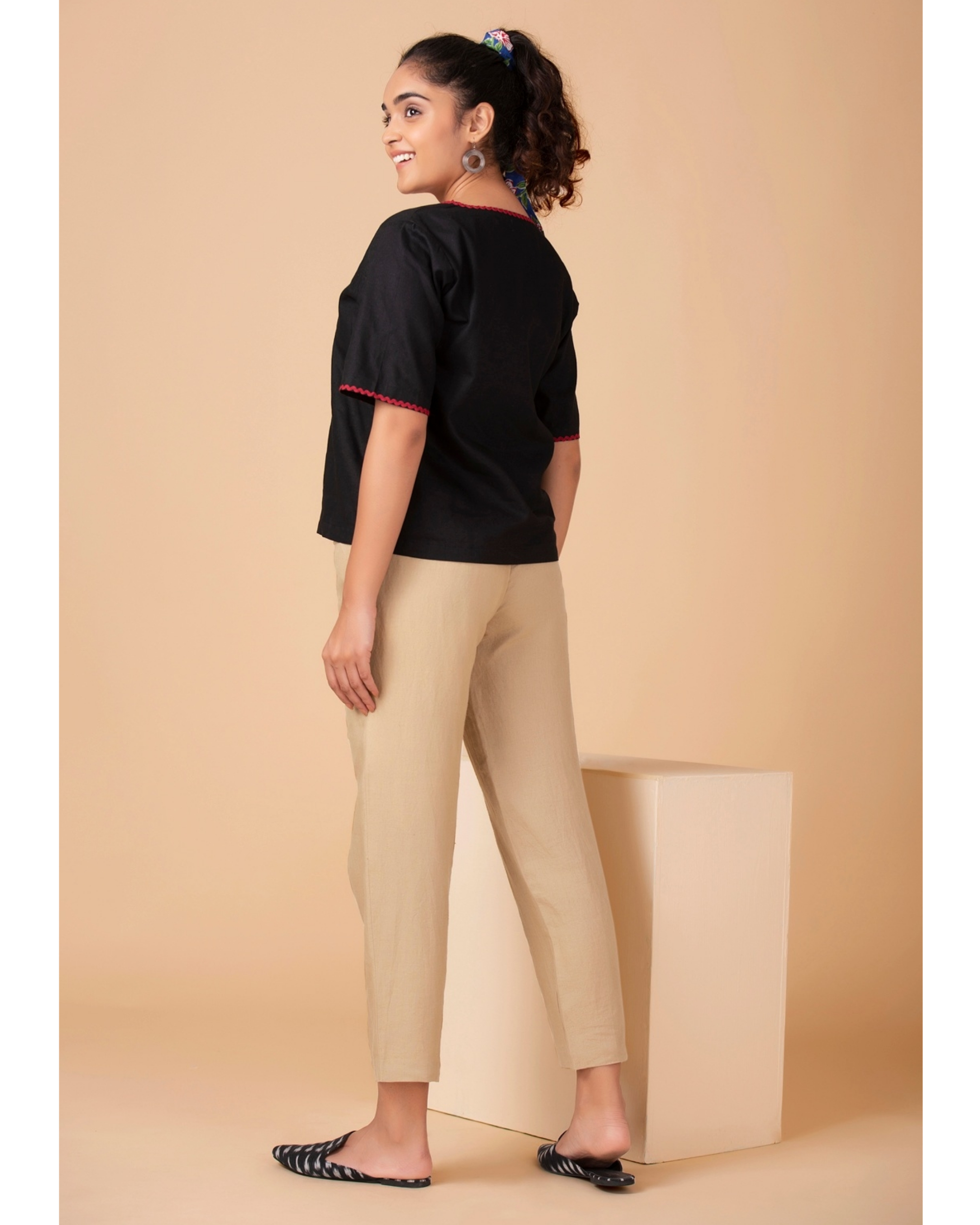 Black contrast trim top by Twirl Studio | The Secret Label