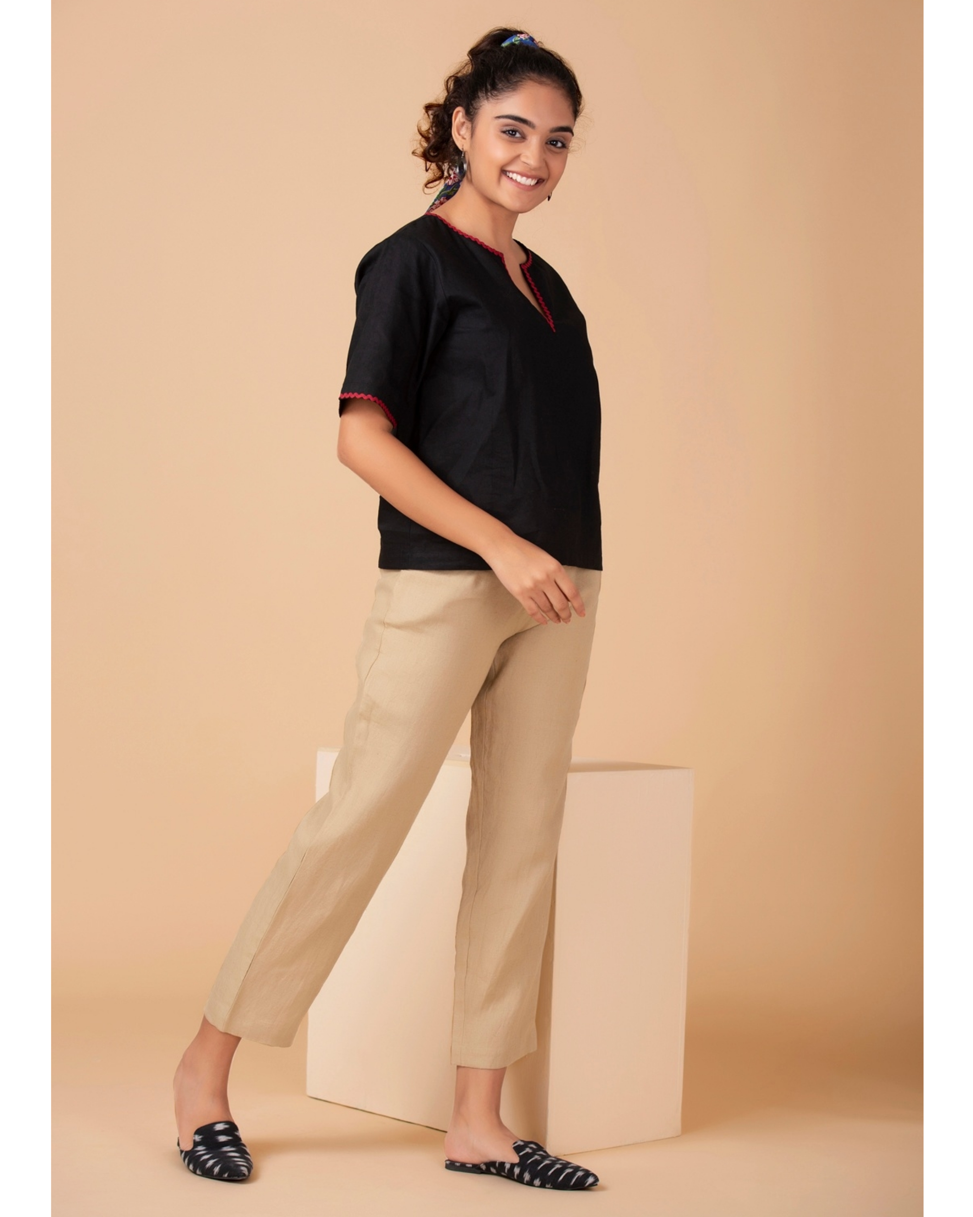 Black contrast trim top by Twirl Studio | The Secret Label