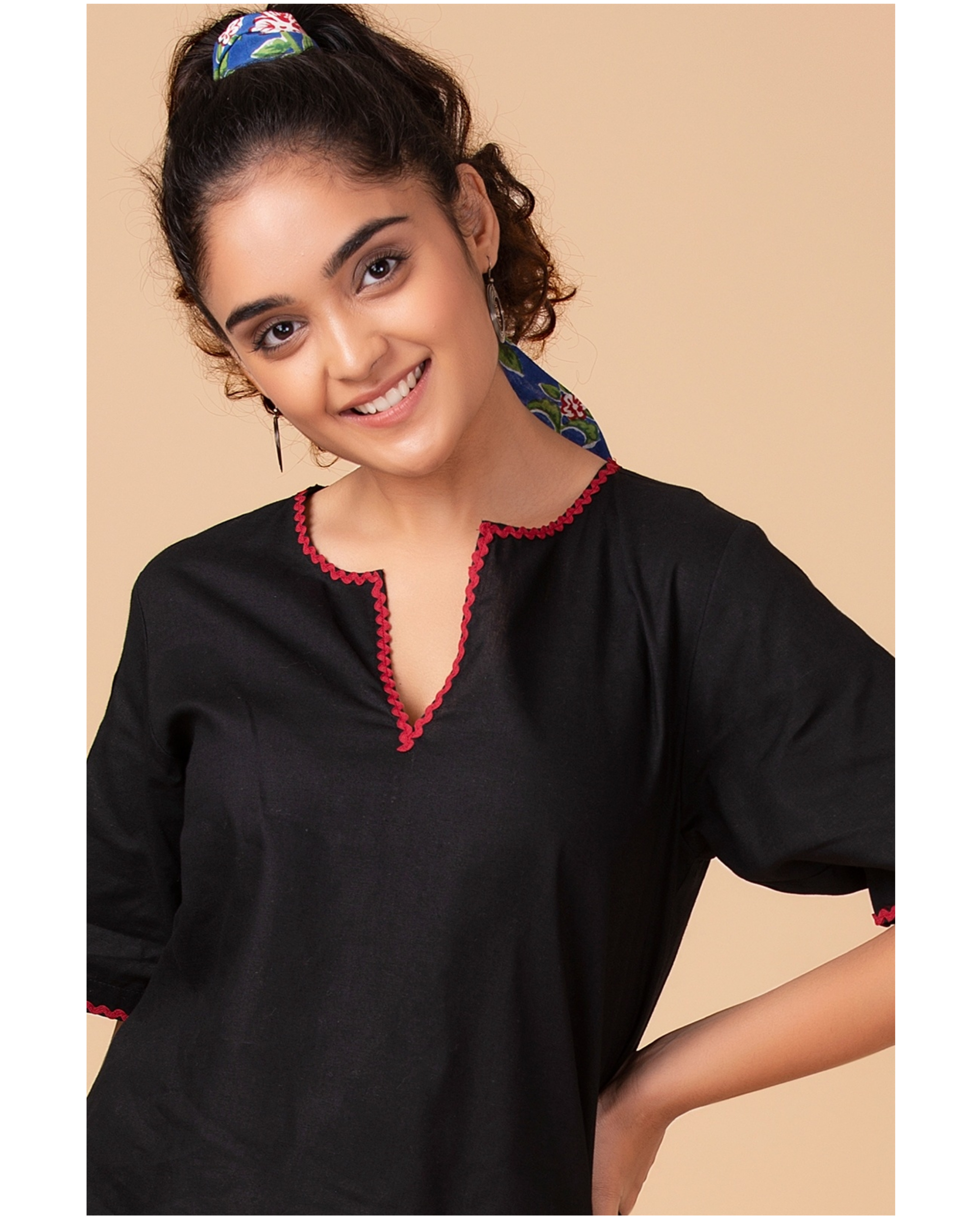 Black contrast trim top by Twirl Studio The Secret Label