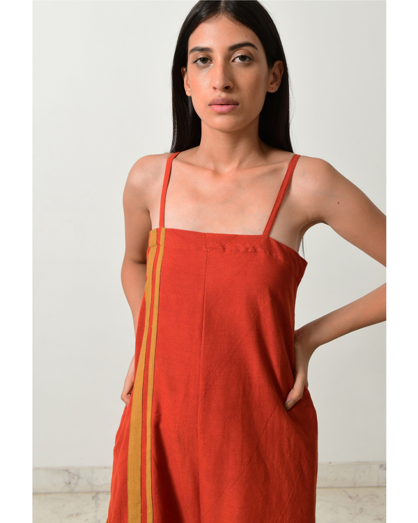 Rust strappy jumpsuit with fire strap piping 3