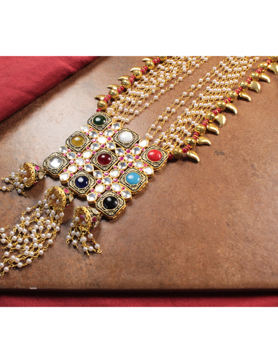 red onyx kundan necklace with emerald cutwork bead and pearls