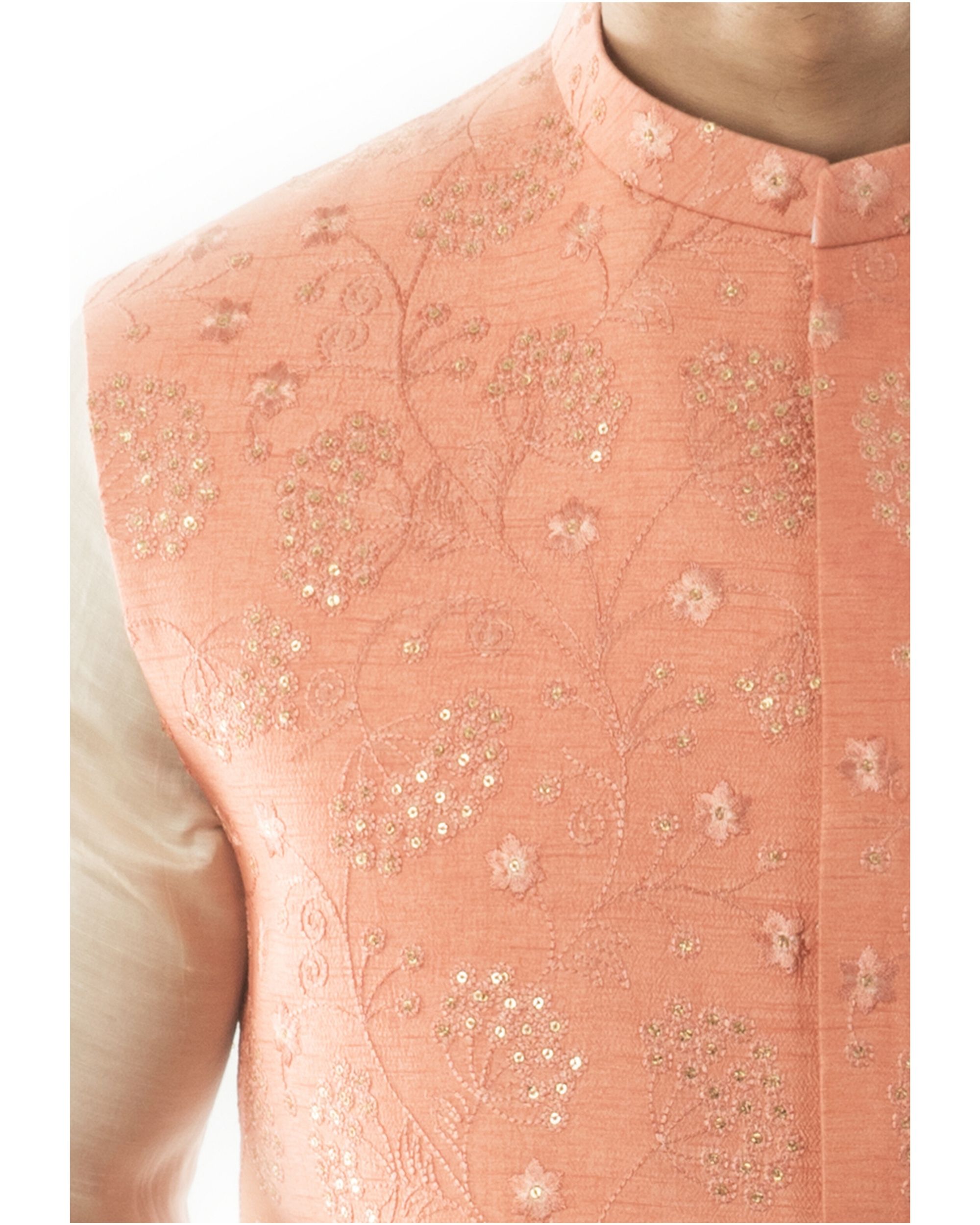 Peach embroidered nehru jacket with sequins detailing by Anushree