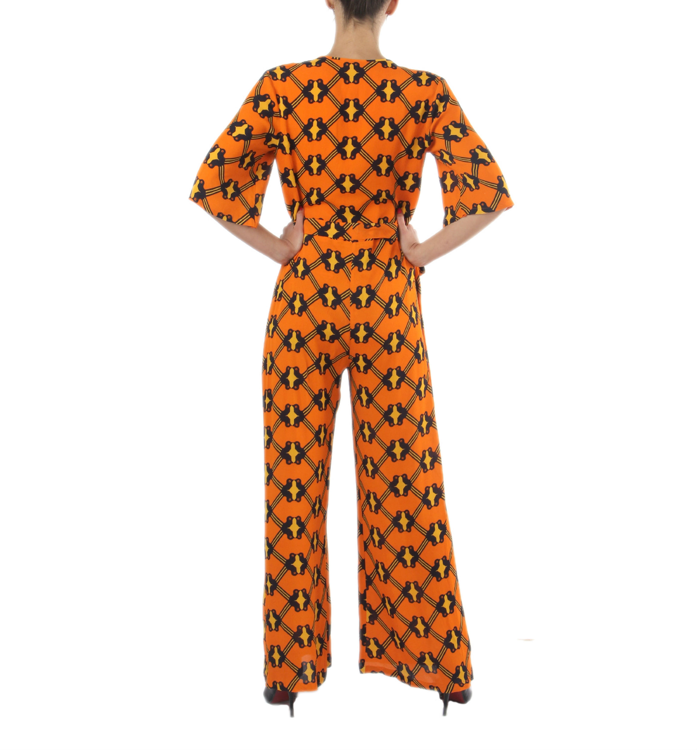Orange printed jumpsuit by Sougat Paul | The Secret Label