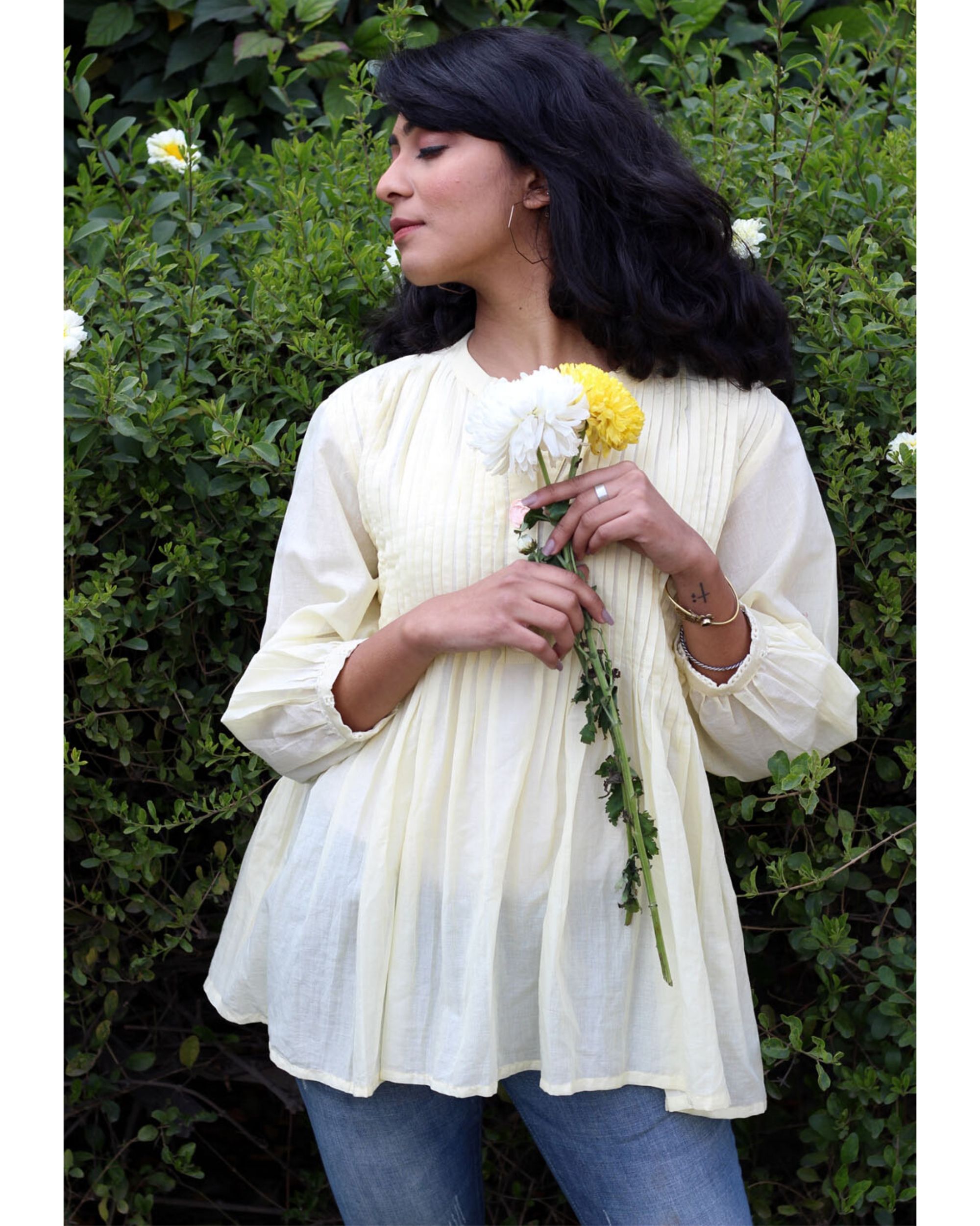 Yellow waterfall pin tucks top by Anecdotes | The Secret Label