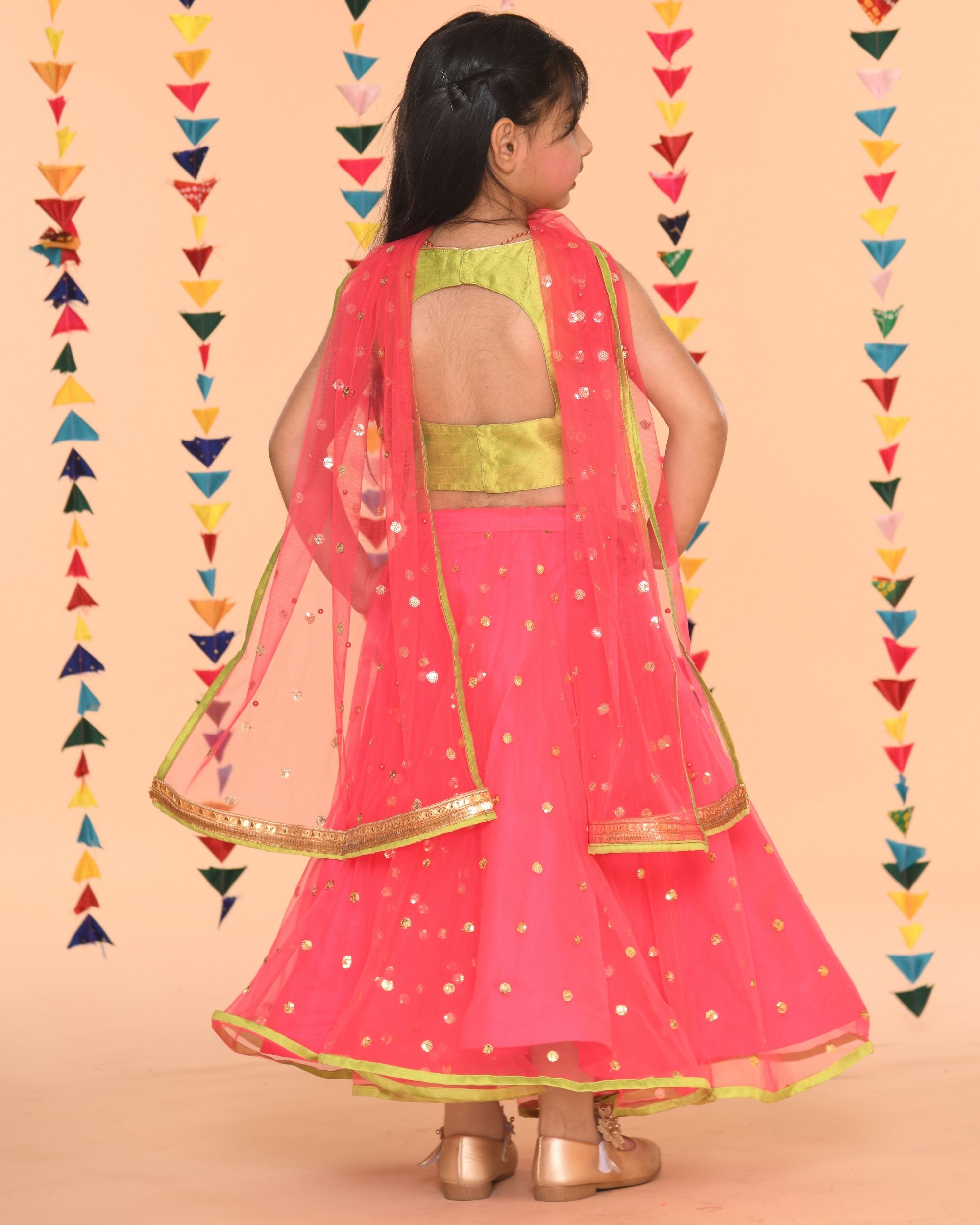 green lehenga with pink choli