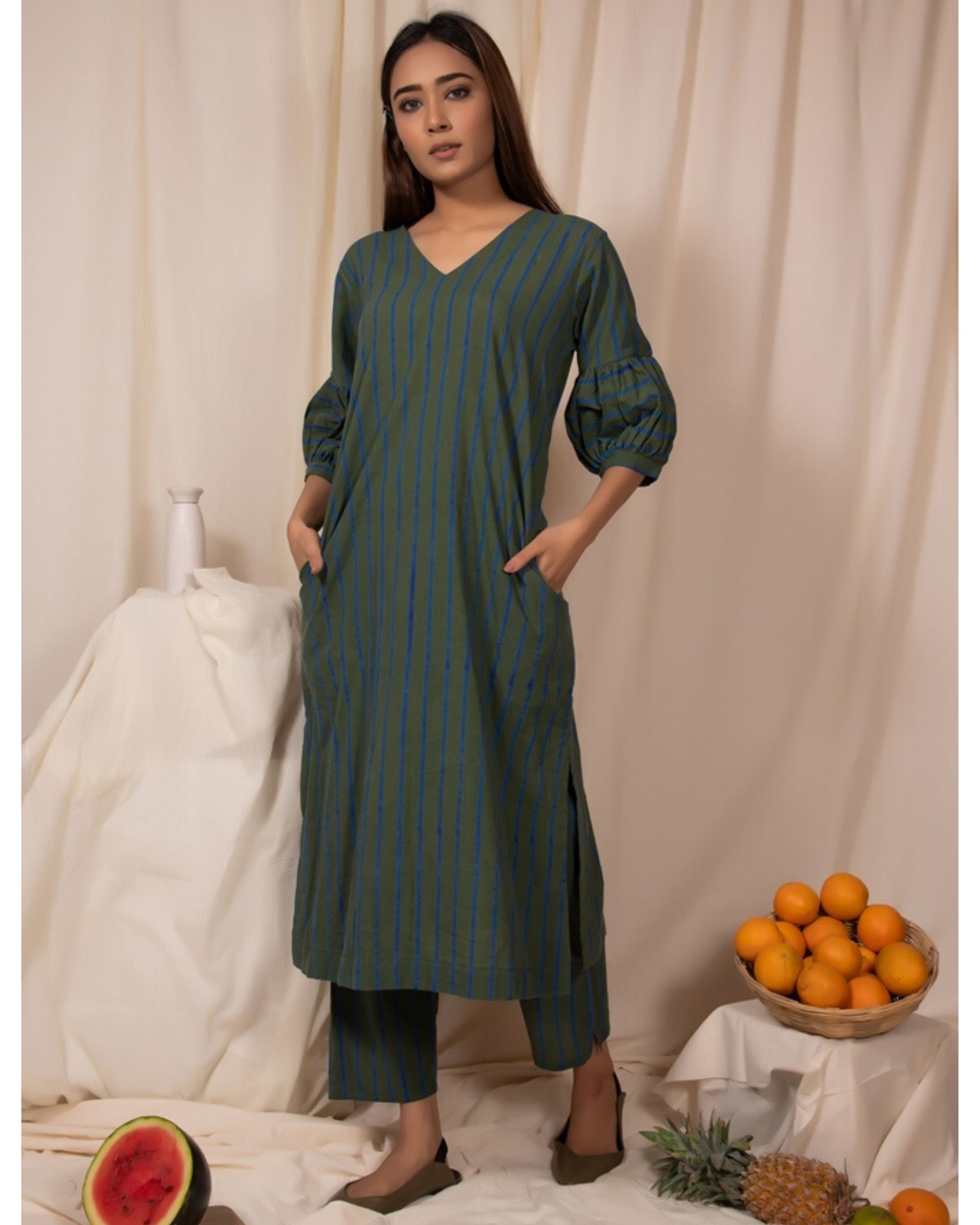 Dark green striped kurta with pockets by Silai | The Secret Label