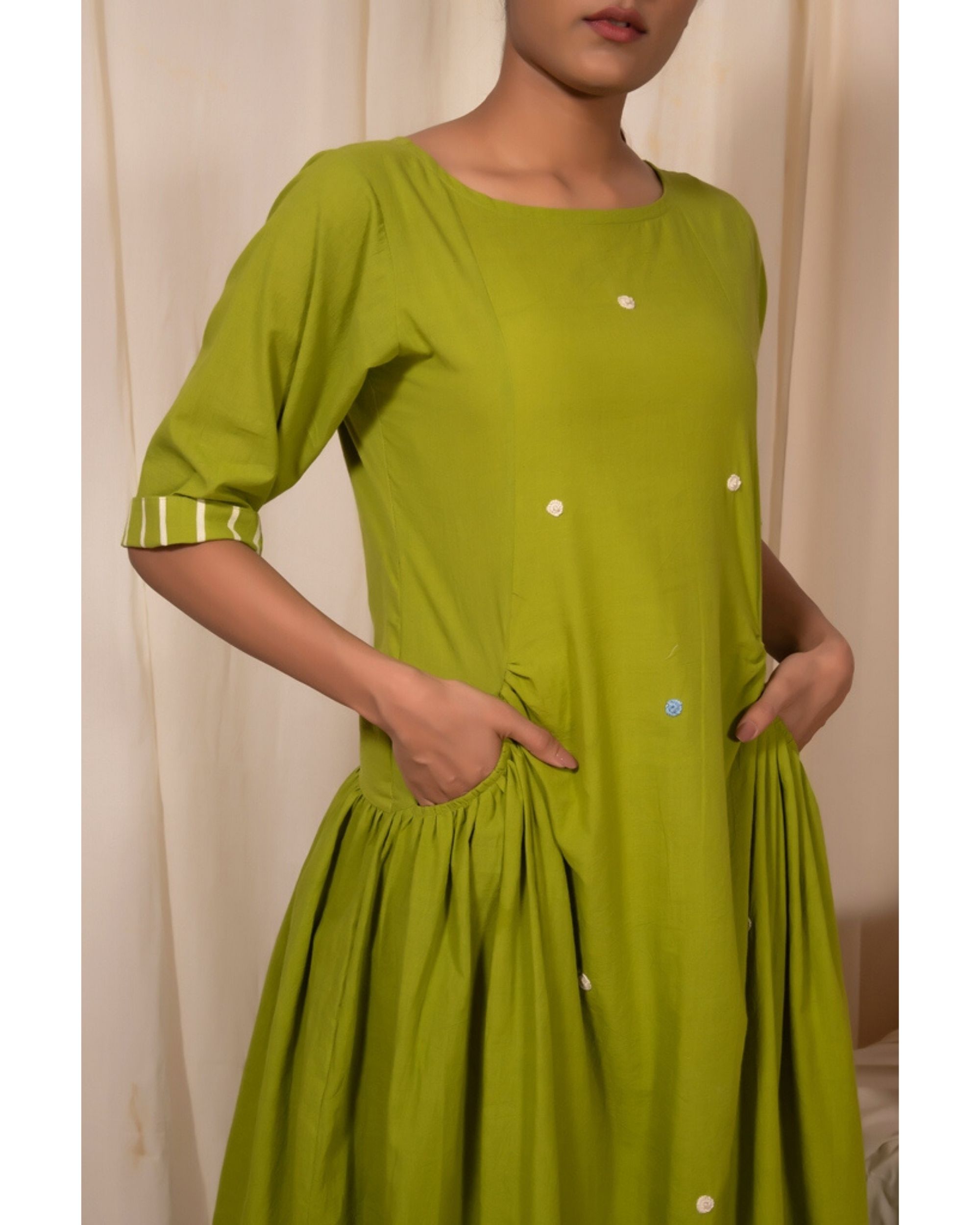 Lime green embroidered dress with pockets by Silai | The Secret Label