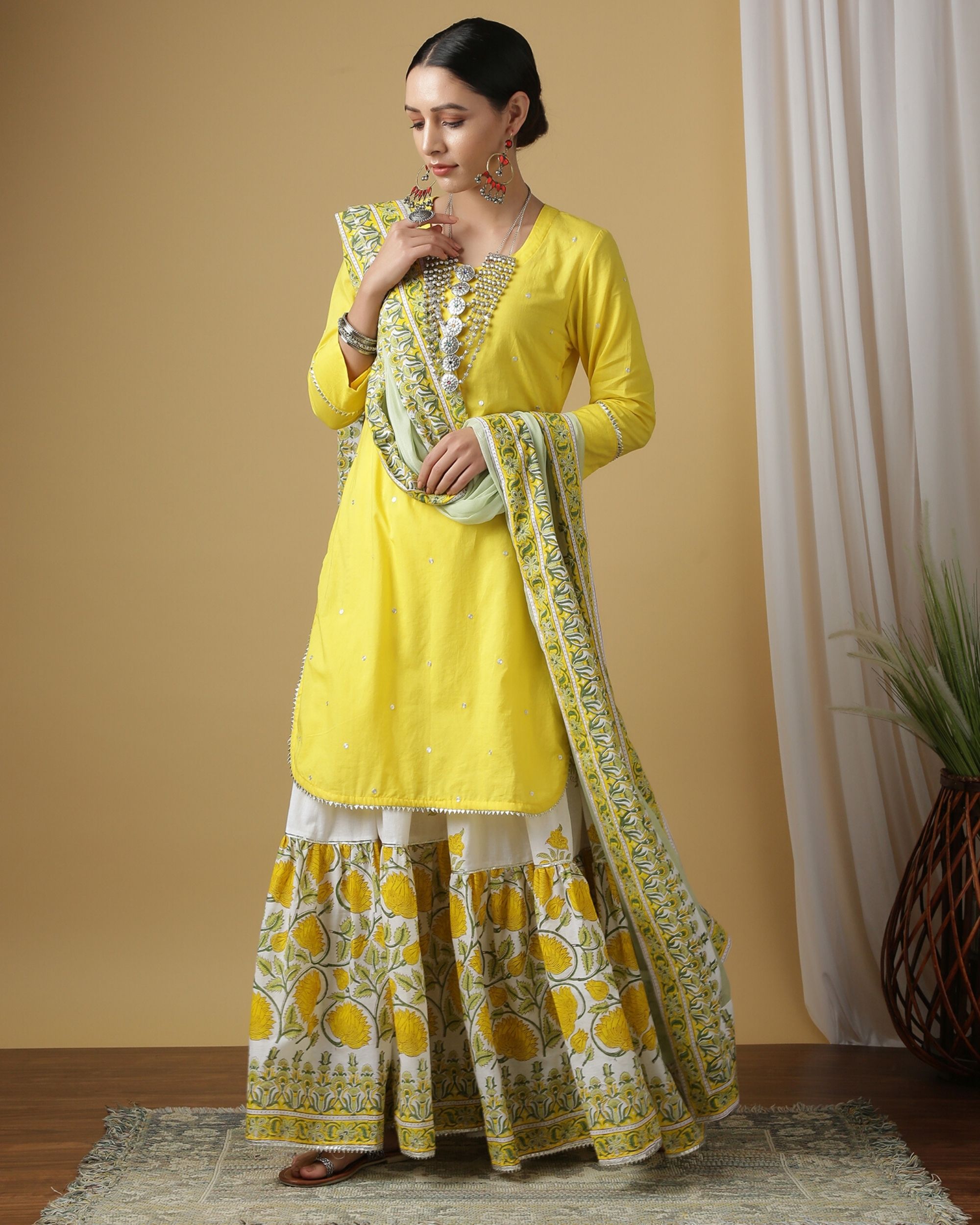 Yellow hand embroidered kurta and floral jaal printed sharara with ...