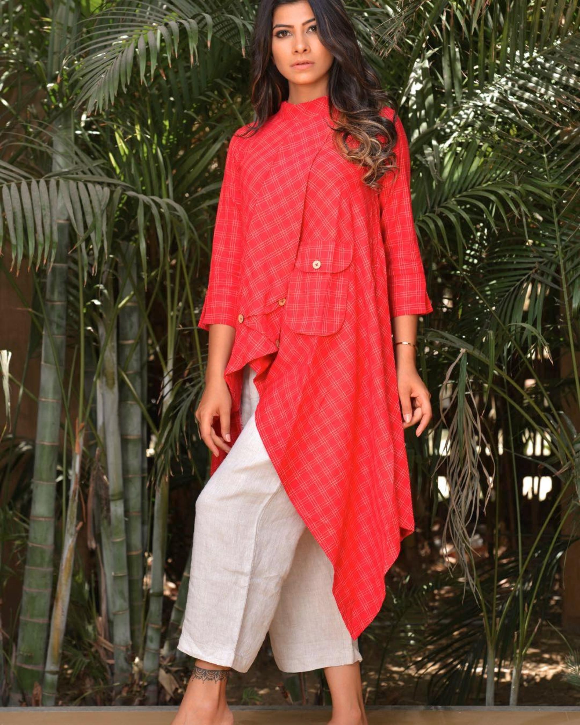 Red tail cut kurta with pocket detailing by Sugandh | The Secret Label