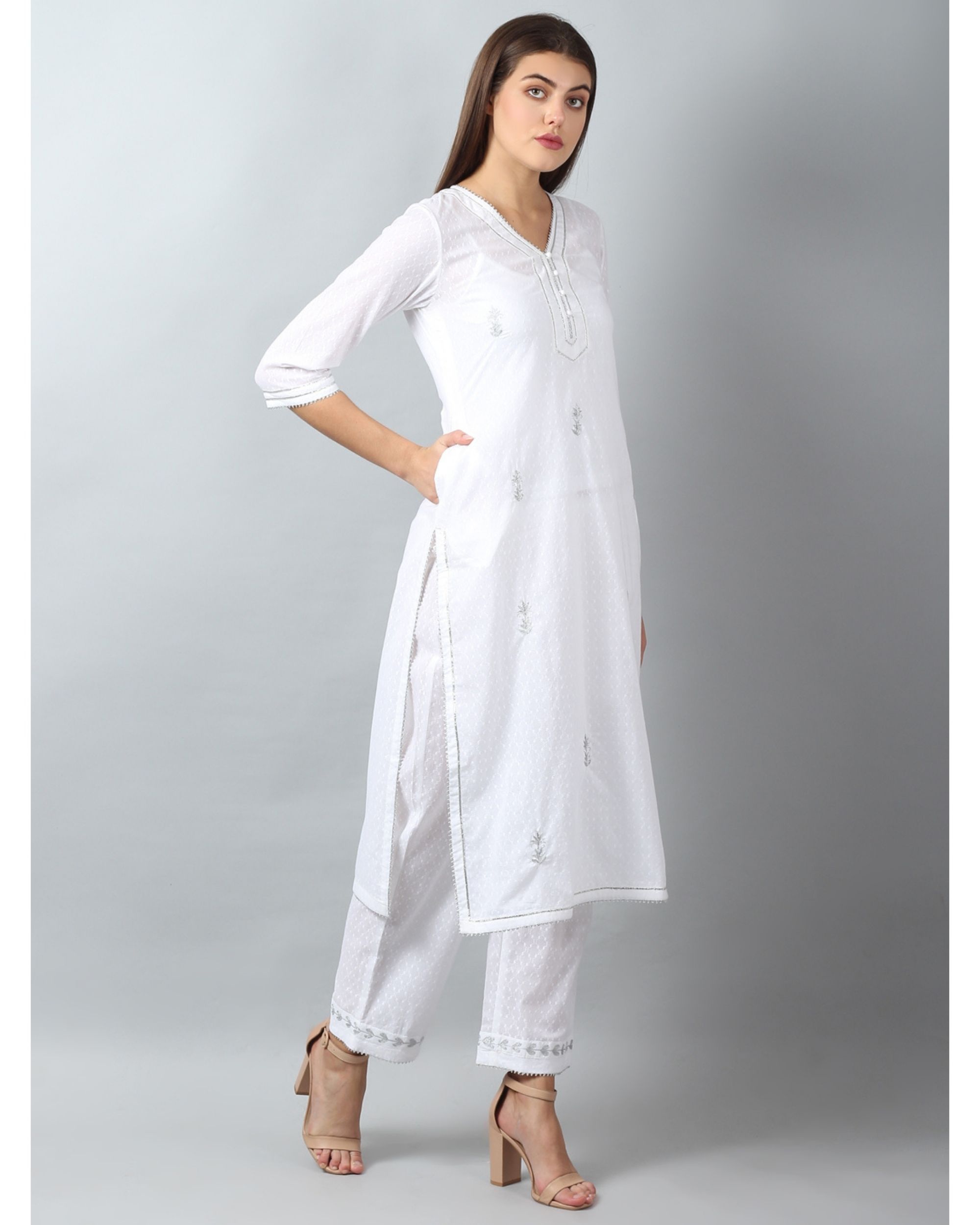 White embroidered pocket kurta and pants - Set Of Two by D'ART STUDIO ...