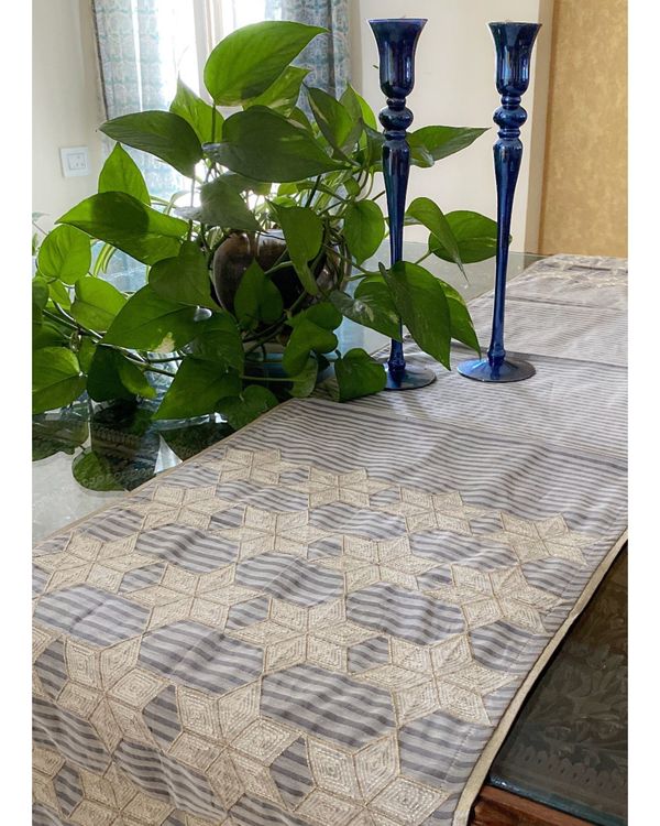 Light grey and white geometric embroidered table runner by Taramira