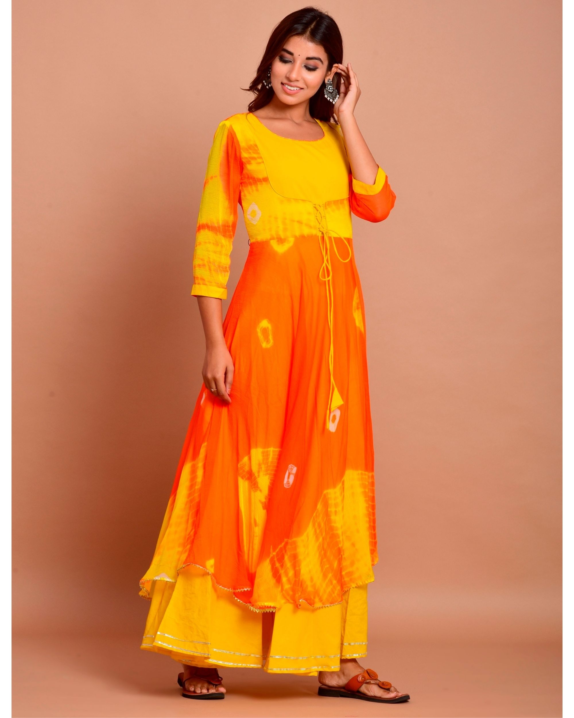 Orange and yellow tie and dye dress with gota work by Chokhi Bandhani ...