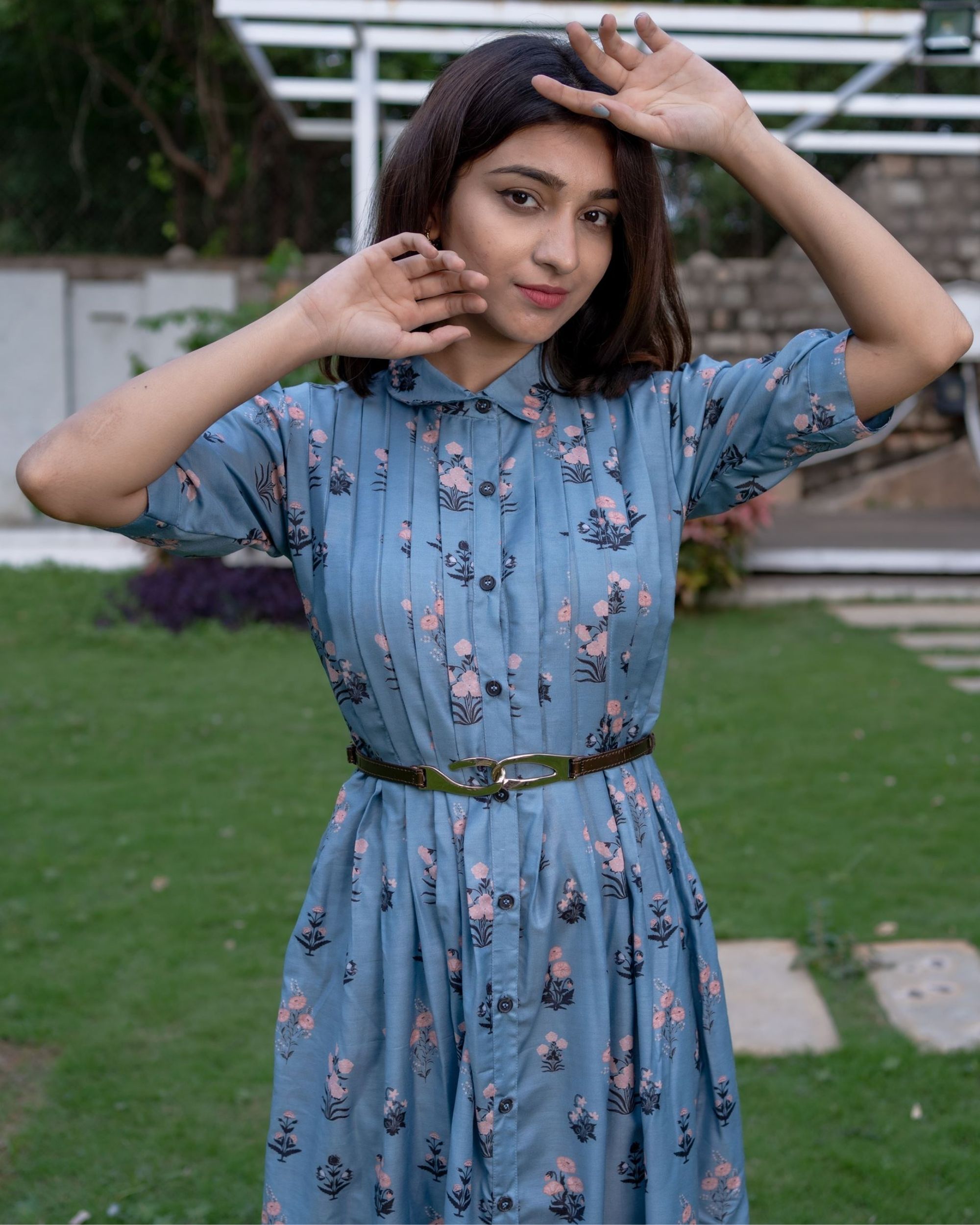 Dark pastel blue floral printed front open dress by Desi Doree